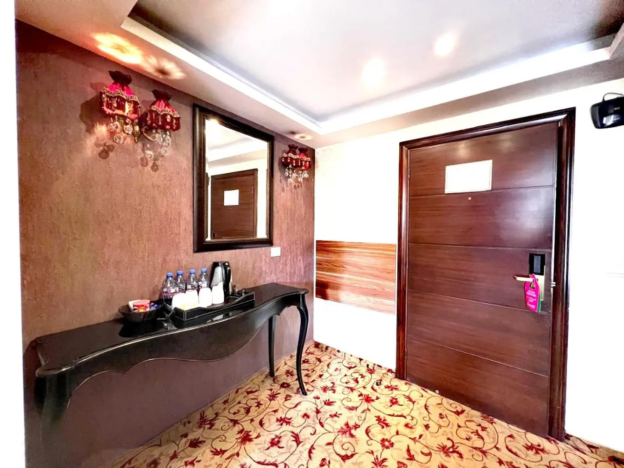 Bedroom in Queens Suite Hotel