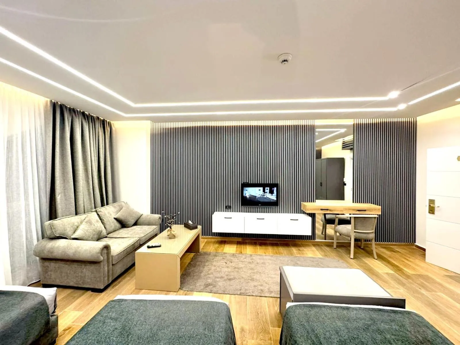 Seating area in Queens Suite Hotel