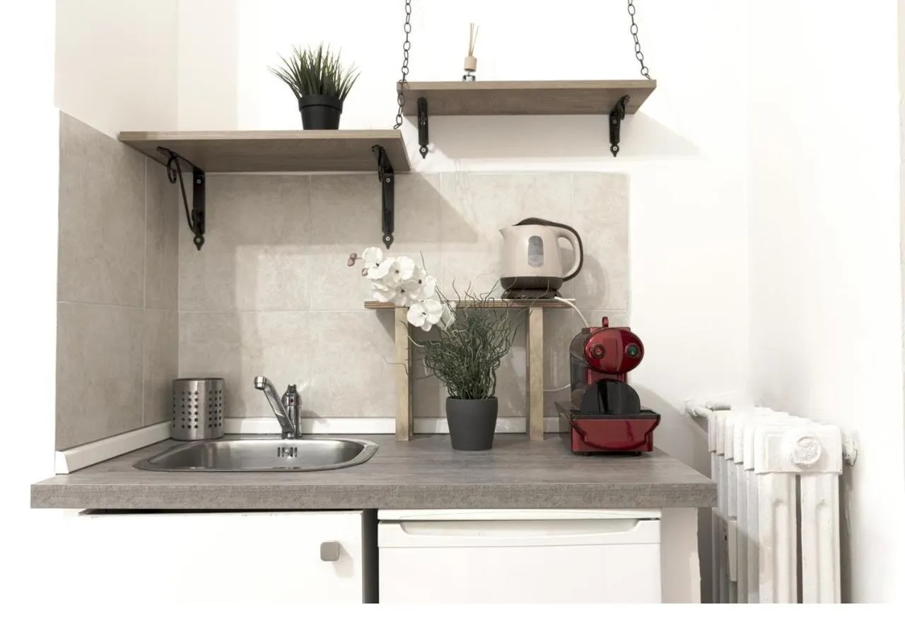 Kitchen or kitchenette in Al Colosseo 8