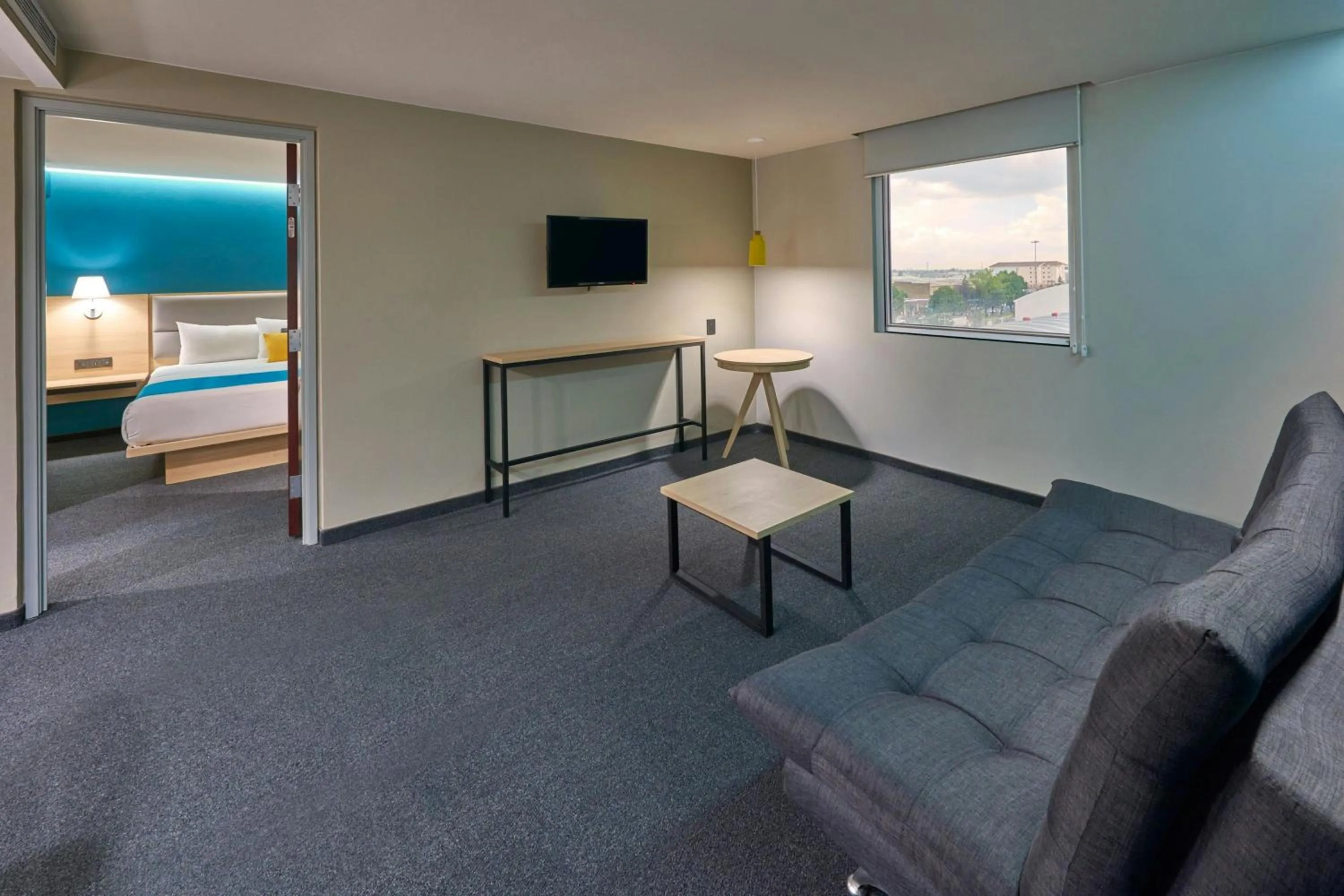 Living room, Bed in City Express by Marriott Toluca