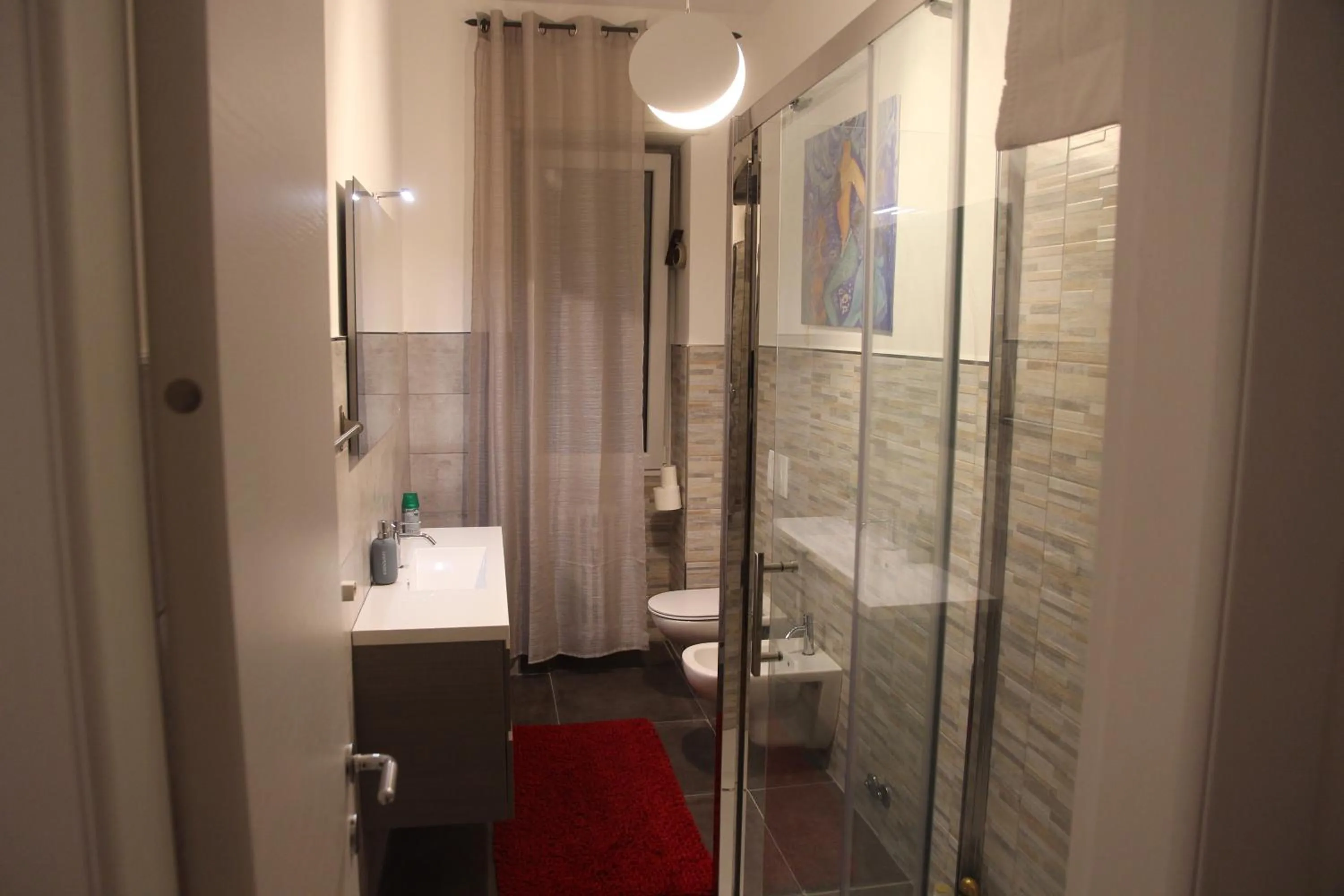 Bathroom in ES - Essential Solution & Emotion Stories (locazione turistica)