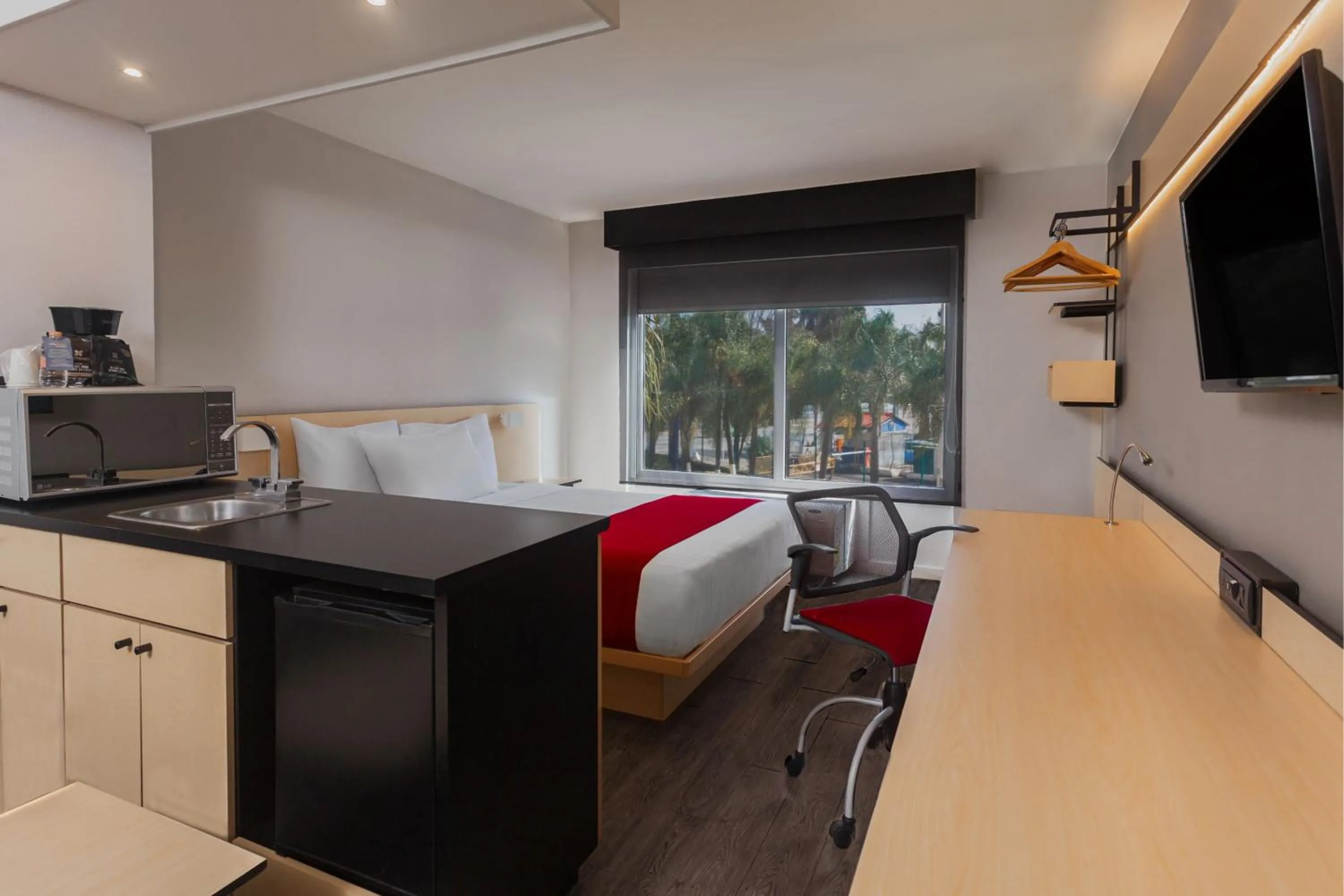 Photo of the whole room, Bed in City Express by Marriott Leon