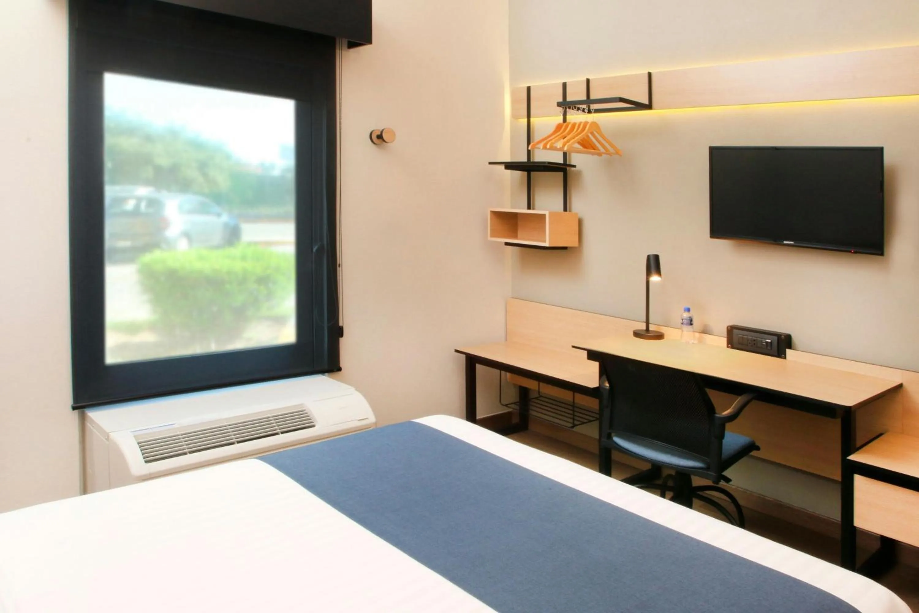 Photo of the whole room, Bed in City Express by Marriott Reynosa