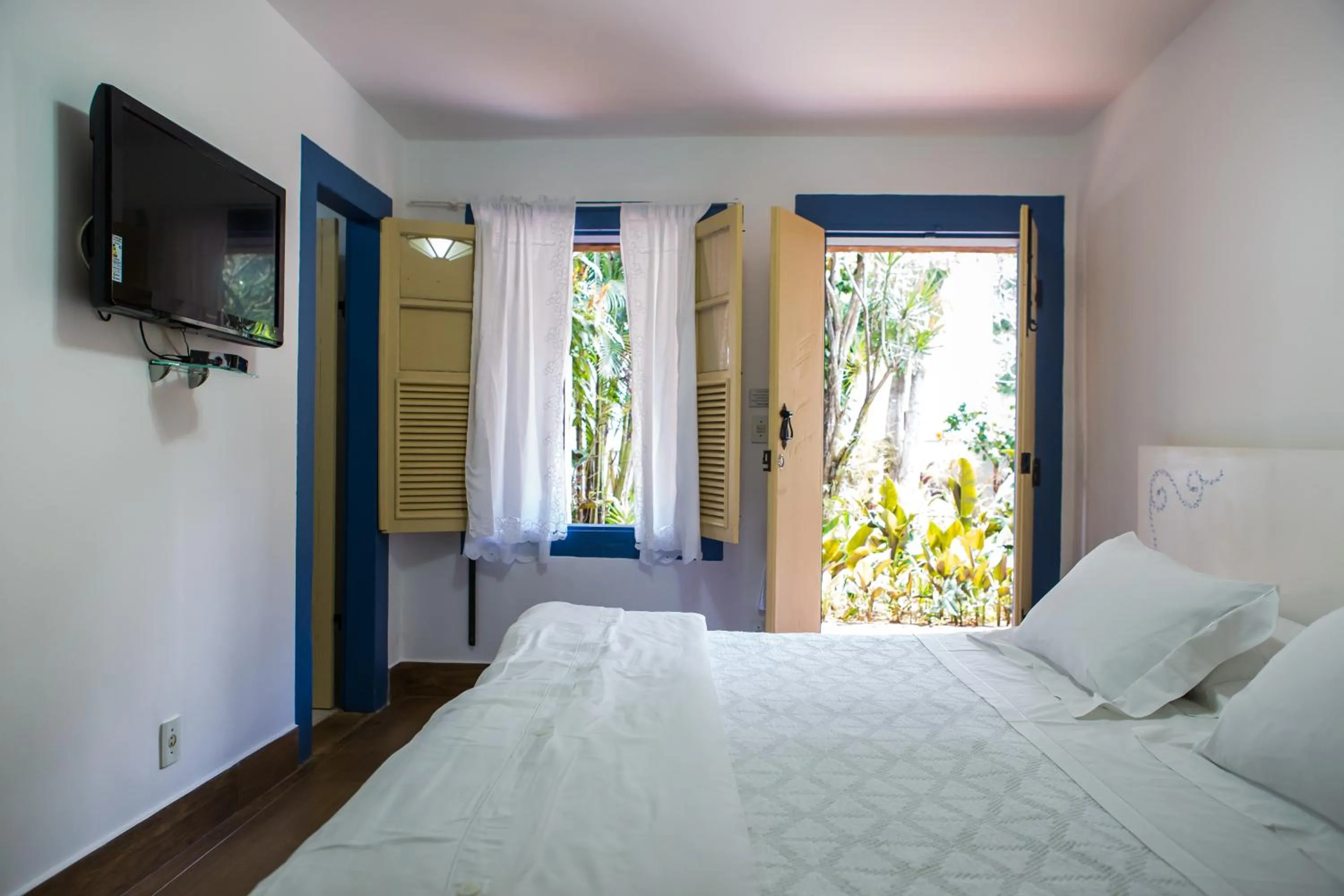 Bed in Pousada Villa Magnolia