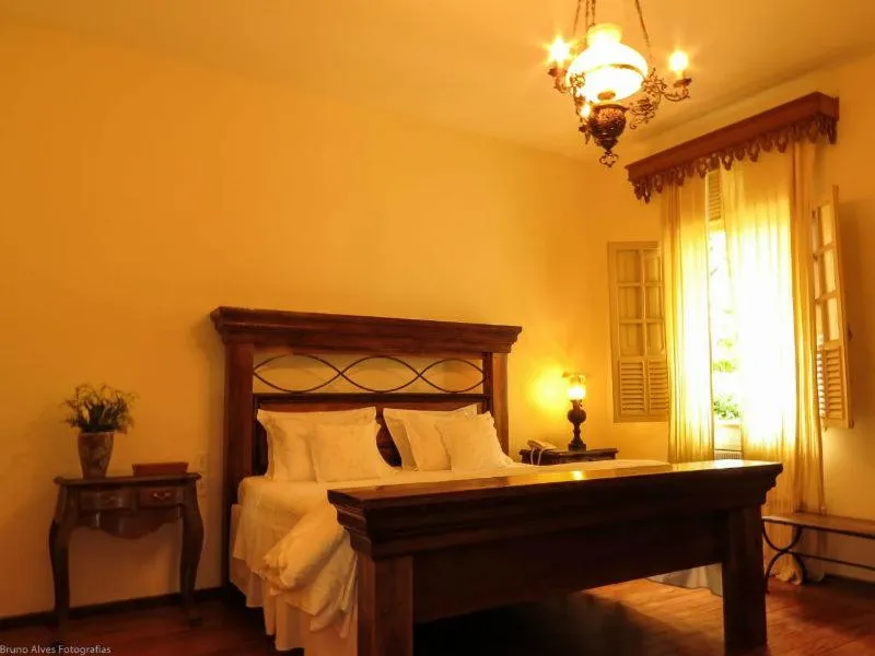 Bed in Pousada Villa Magnolia