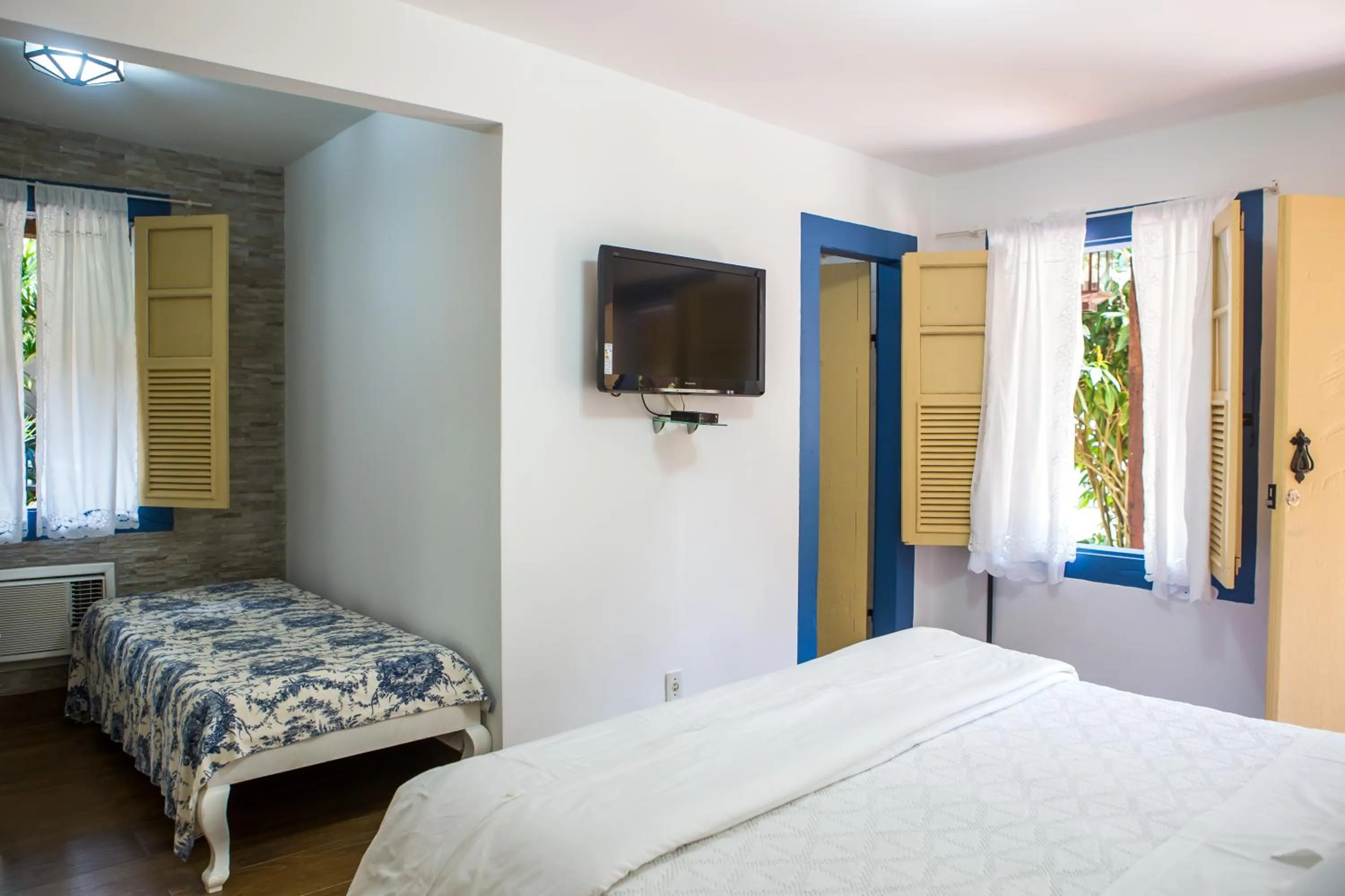 Garden view, Bed in Pousada Villa Magnolia