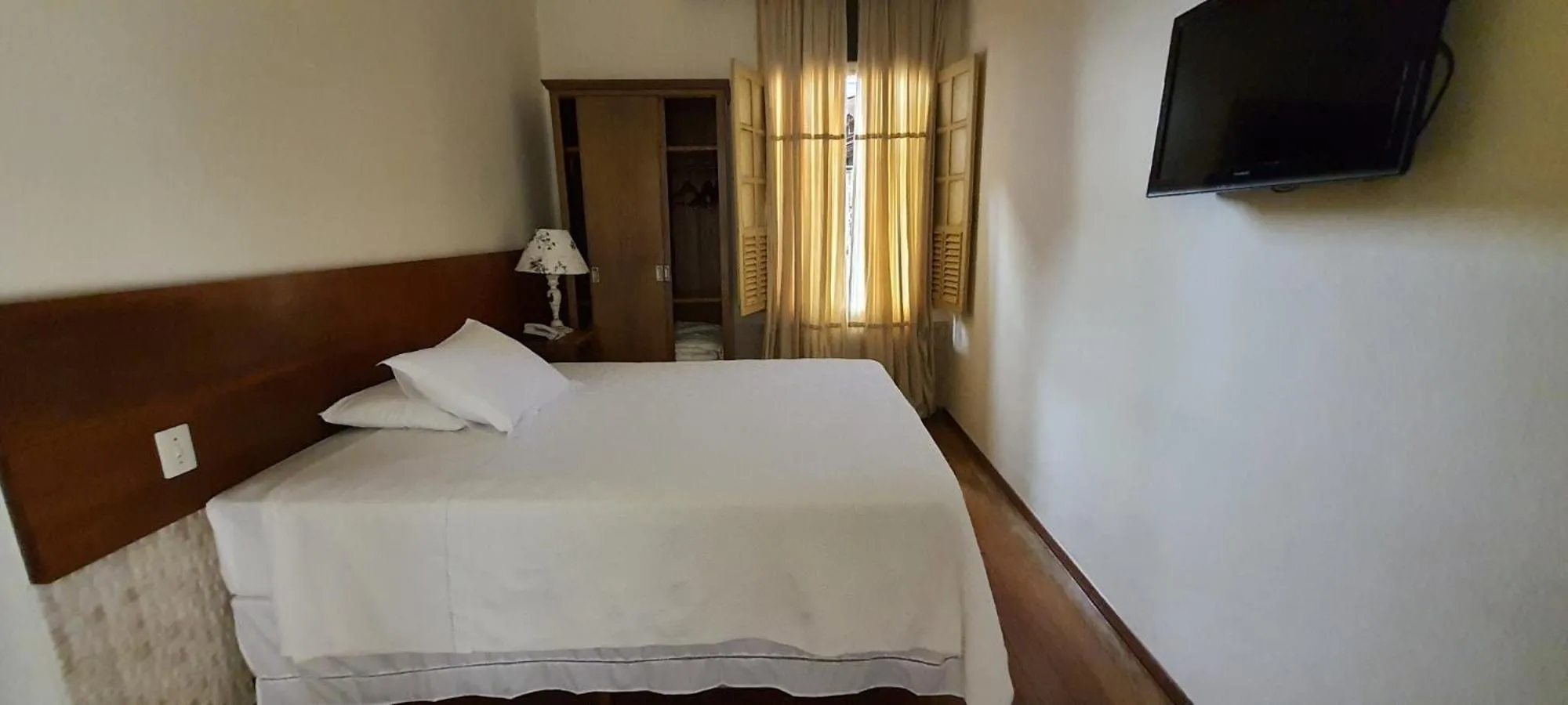 Bed in Pousada Villa Magnolia