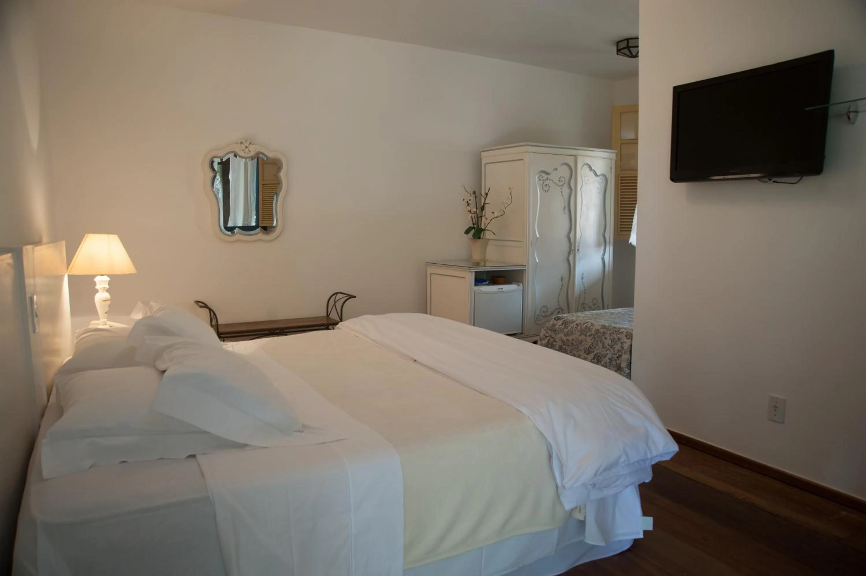 Bed in Pousada Villa Magnolia