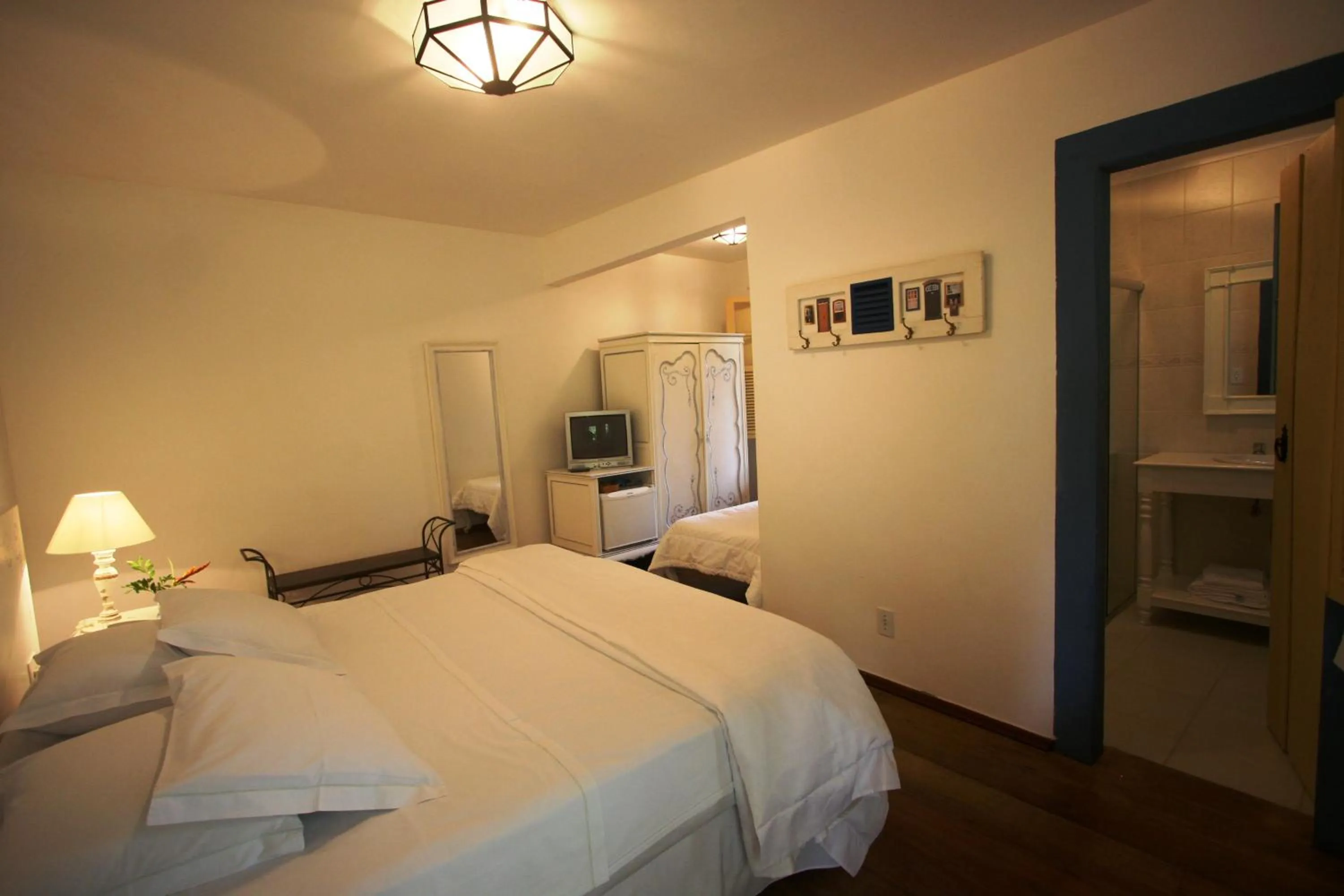 Bed in Pousada Villa Magnolia