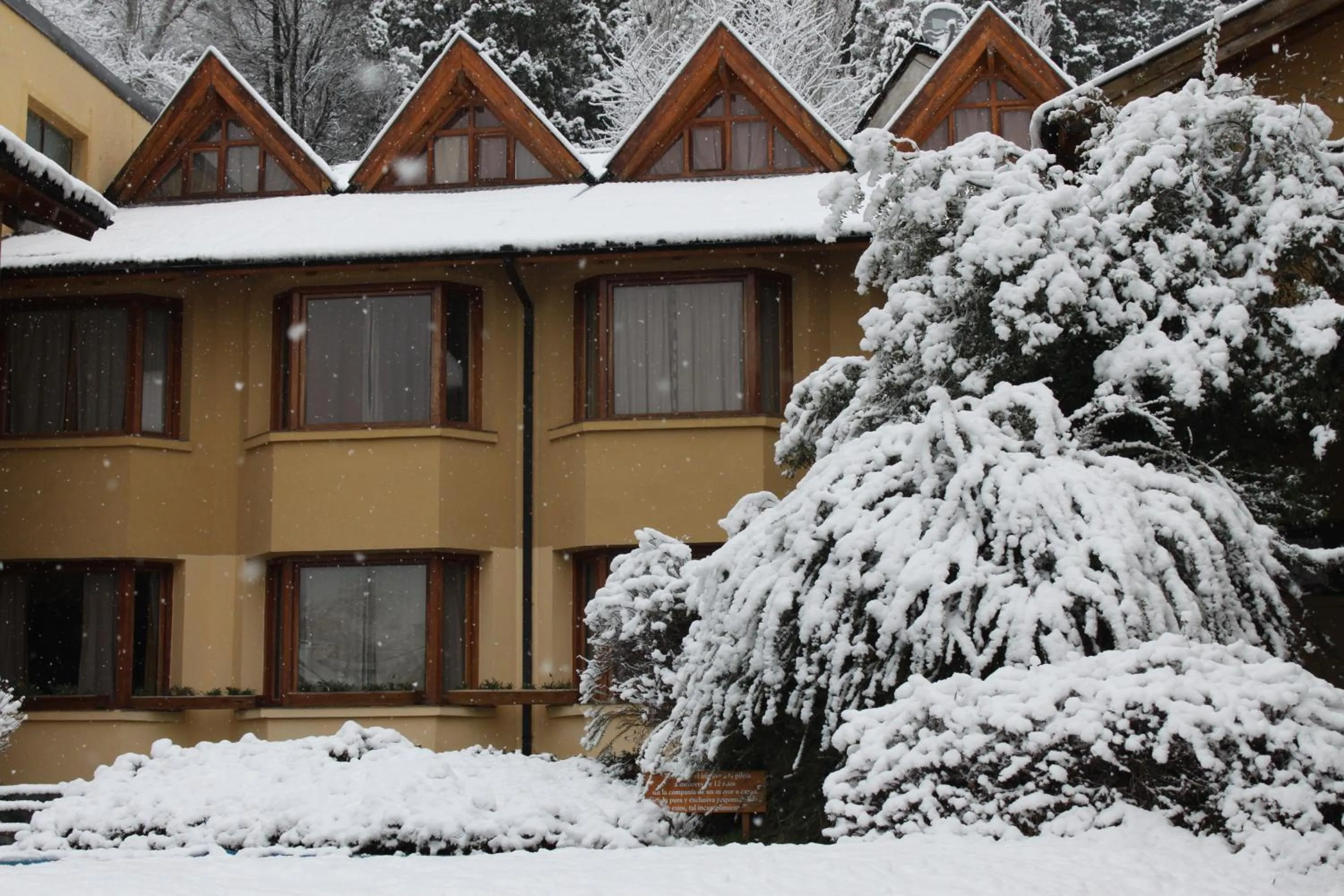 Facade/entrance in Hosteria Las Lengas by Visionnaire