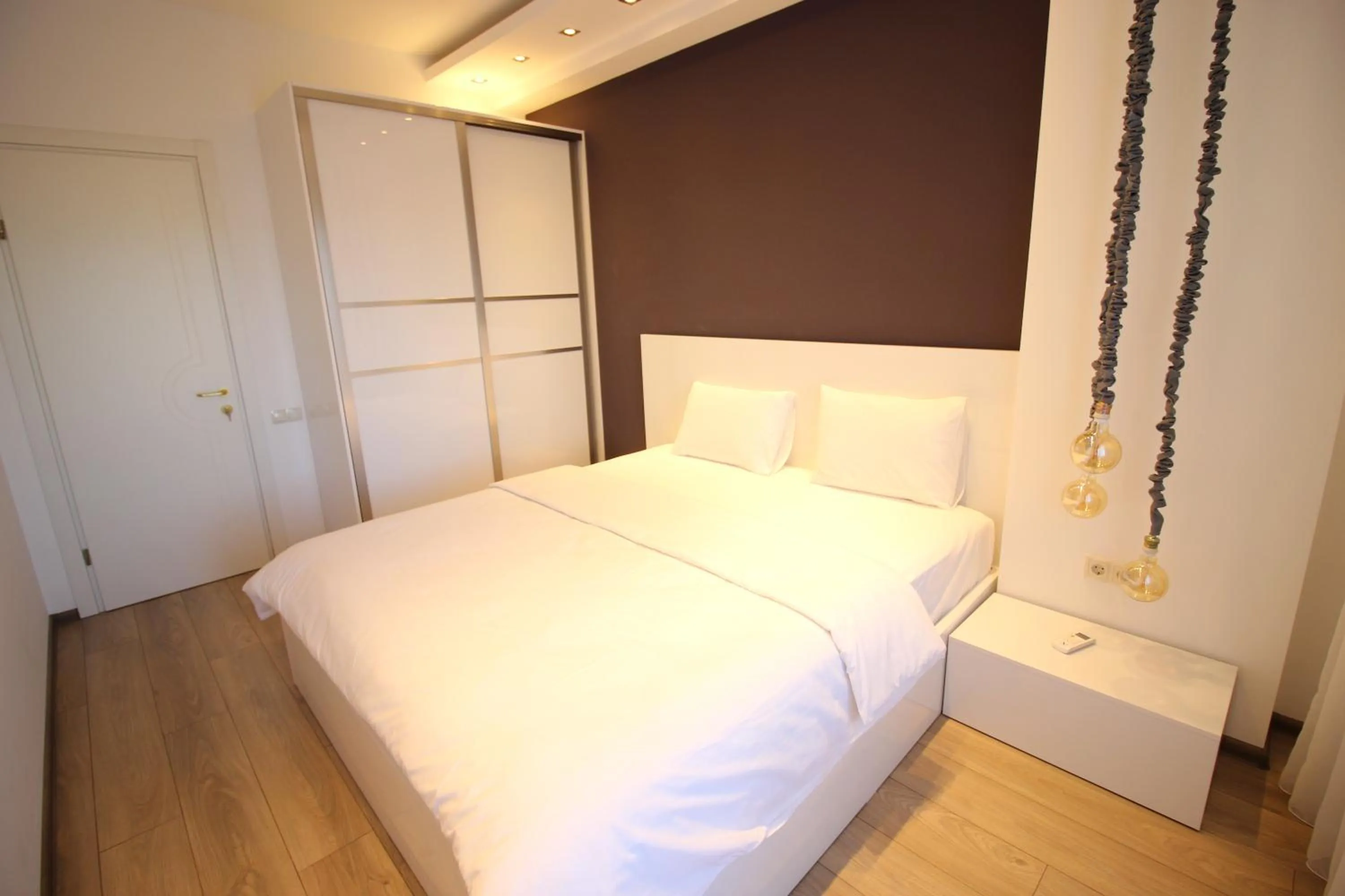 Bedroom, Bed in Superior Apartments