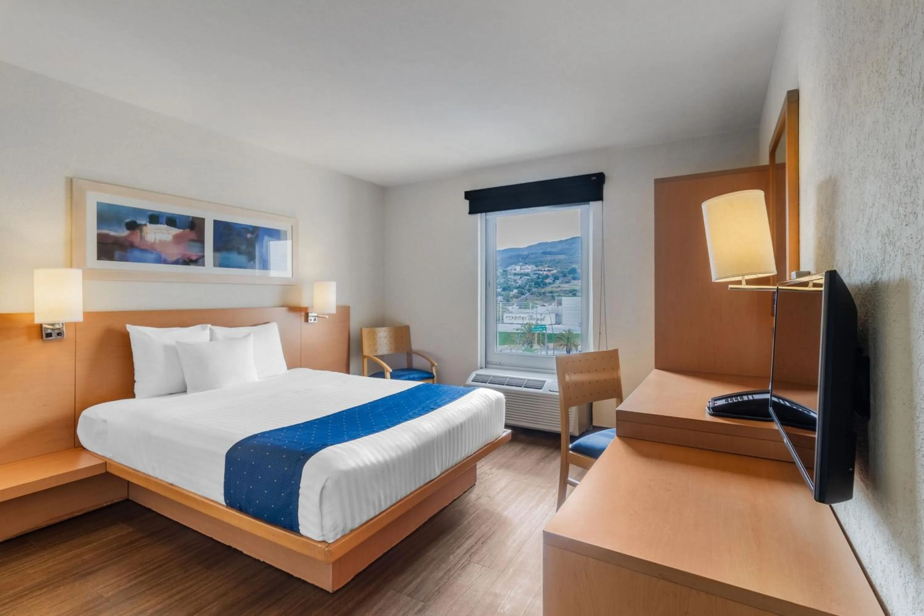 Photo of the whole room, Bed in City Express by Marriott Tuxtla Gutiérrez