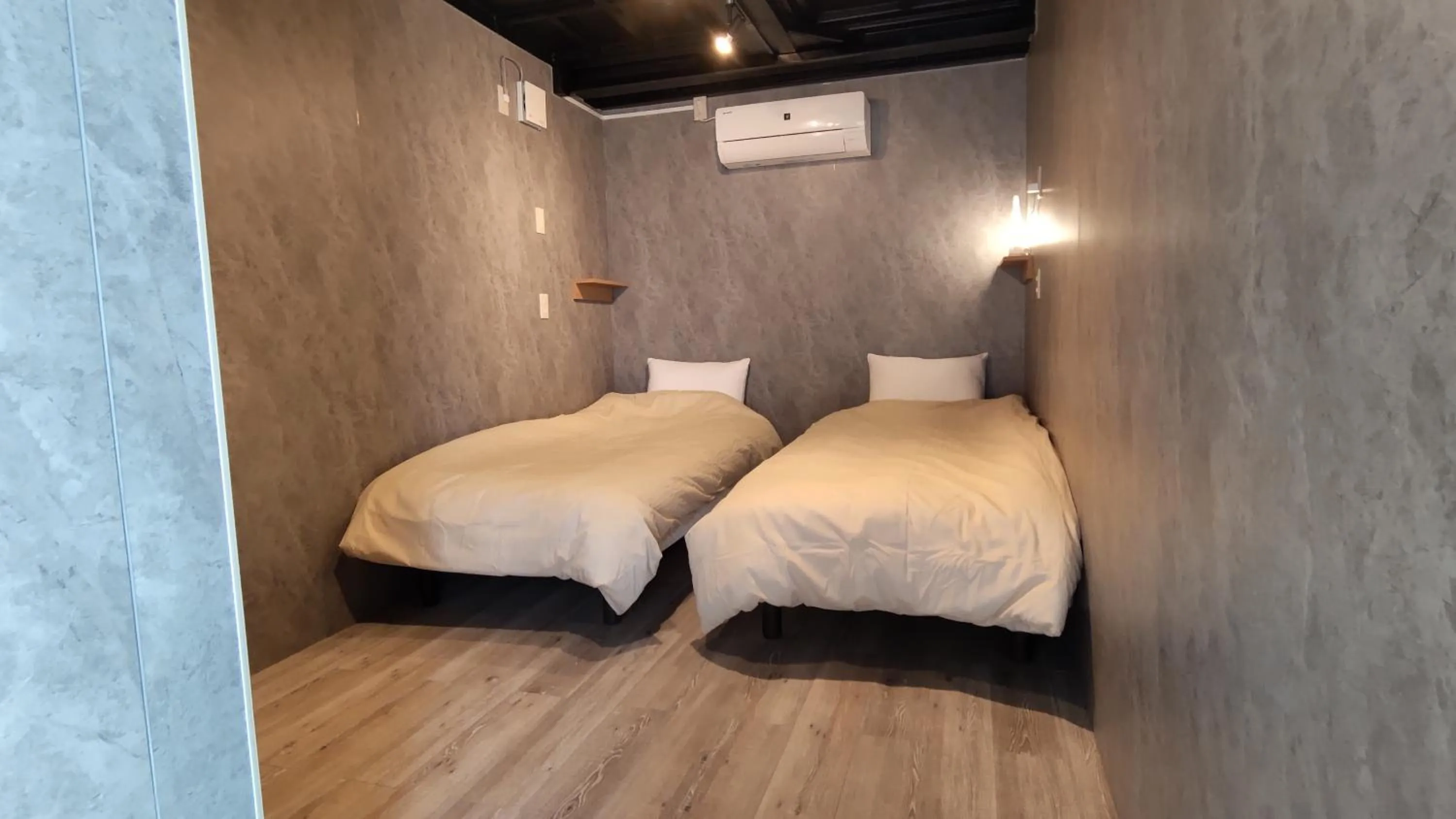 Bed in Hanamuro Inn Aka Island