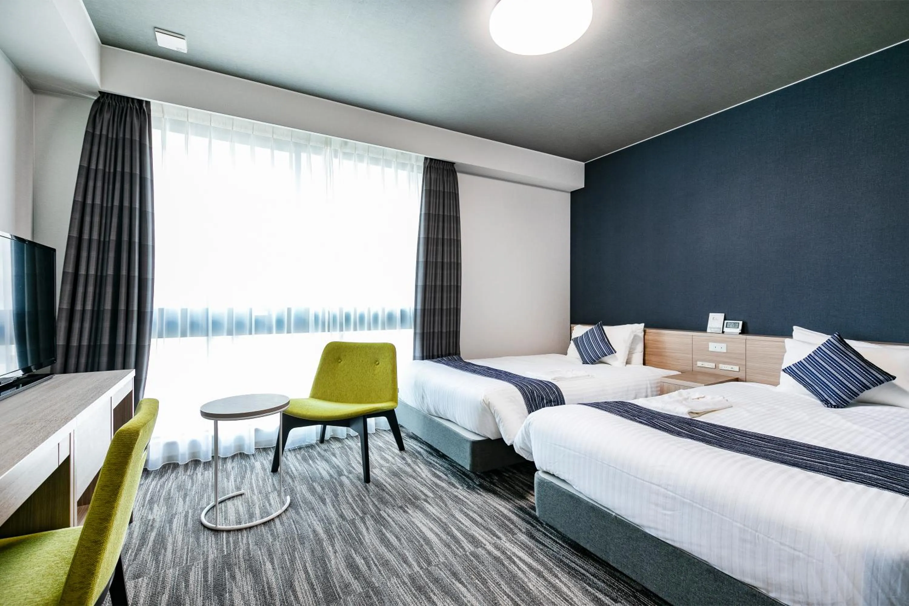 Bed in Shizutetsu Hotel Prezio Hakataekimae