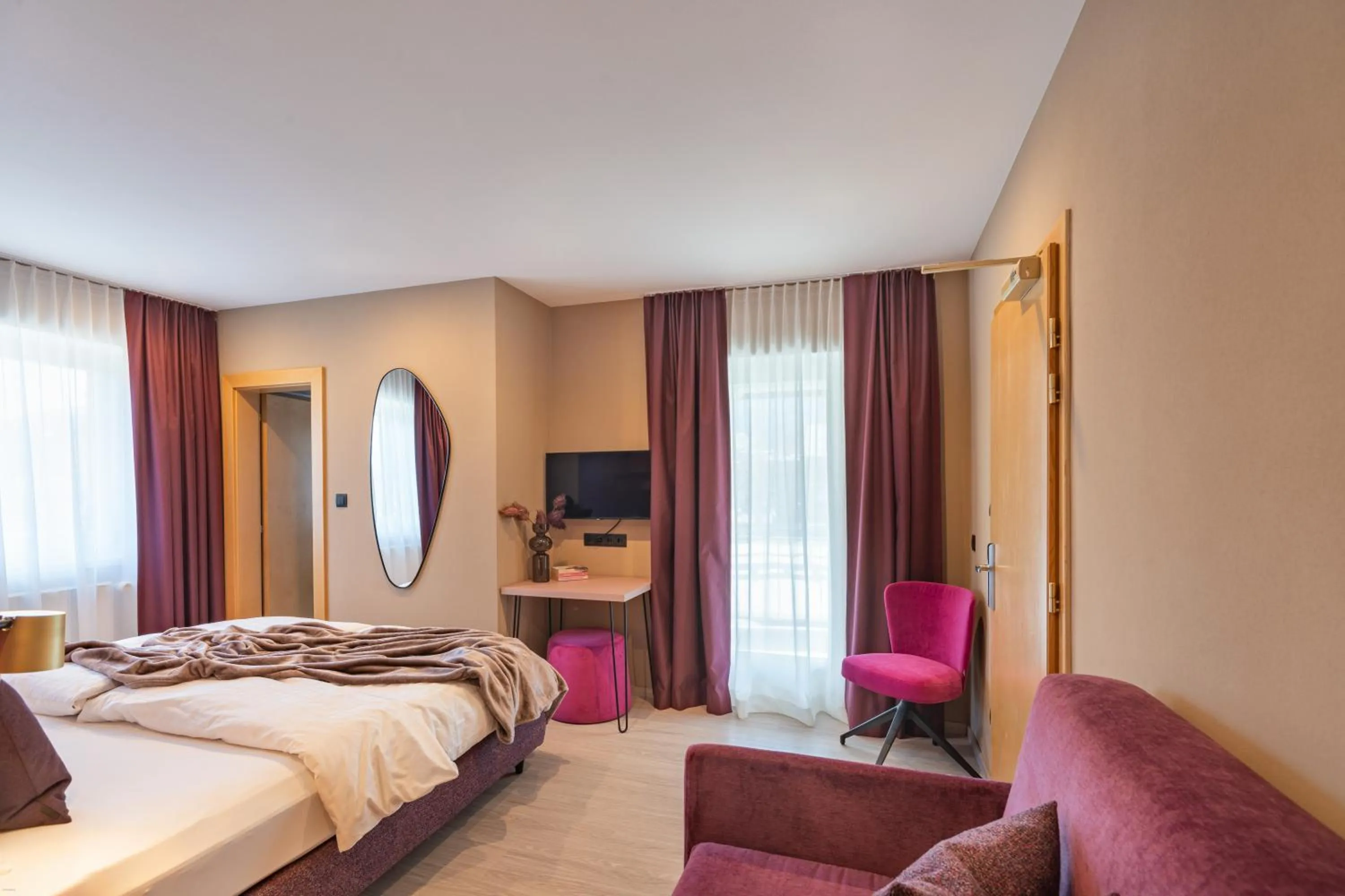 Communal lounge/ TV room, Bed in Boutique Hotel Am Park