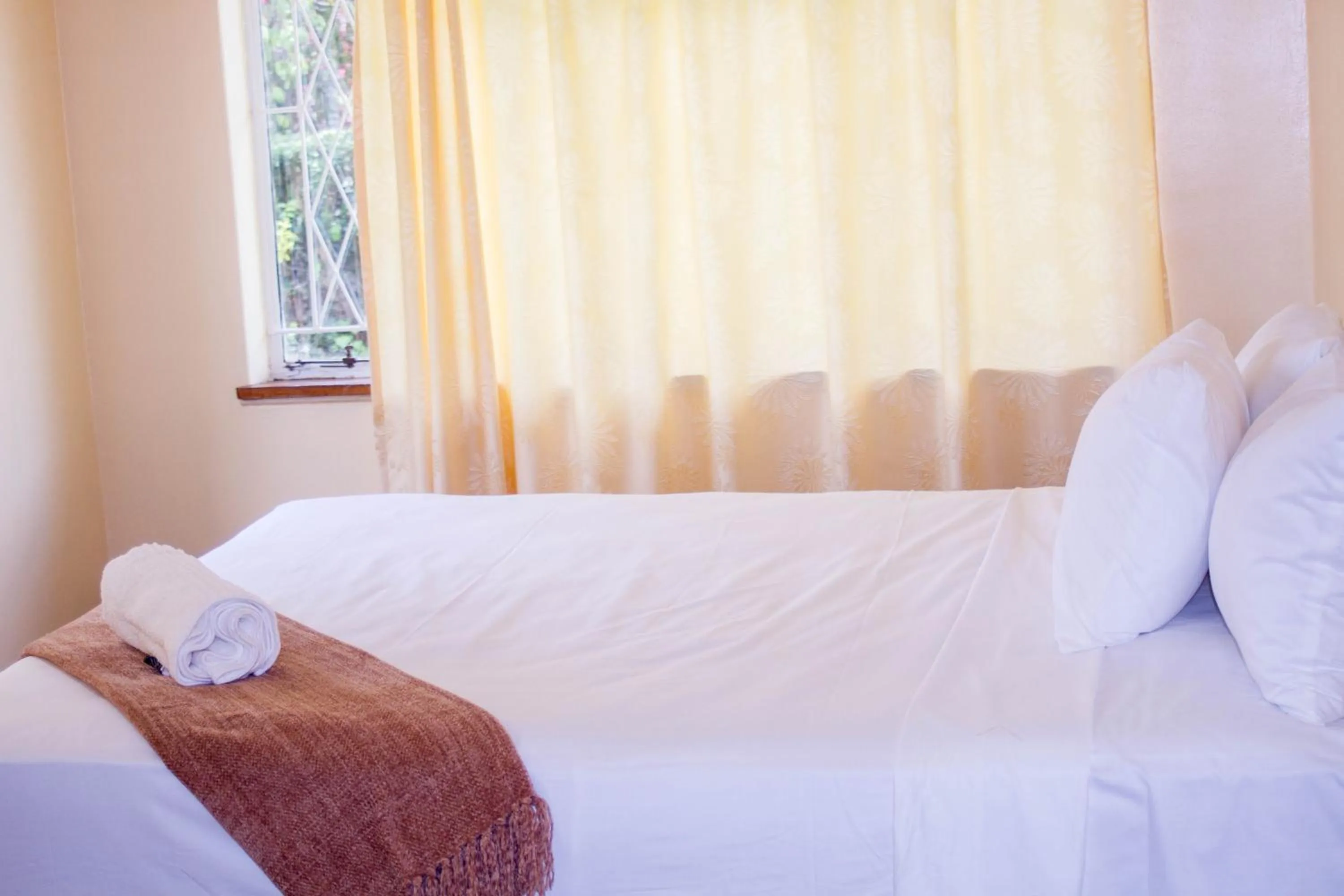 Bed in Royal Guest House