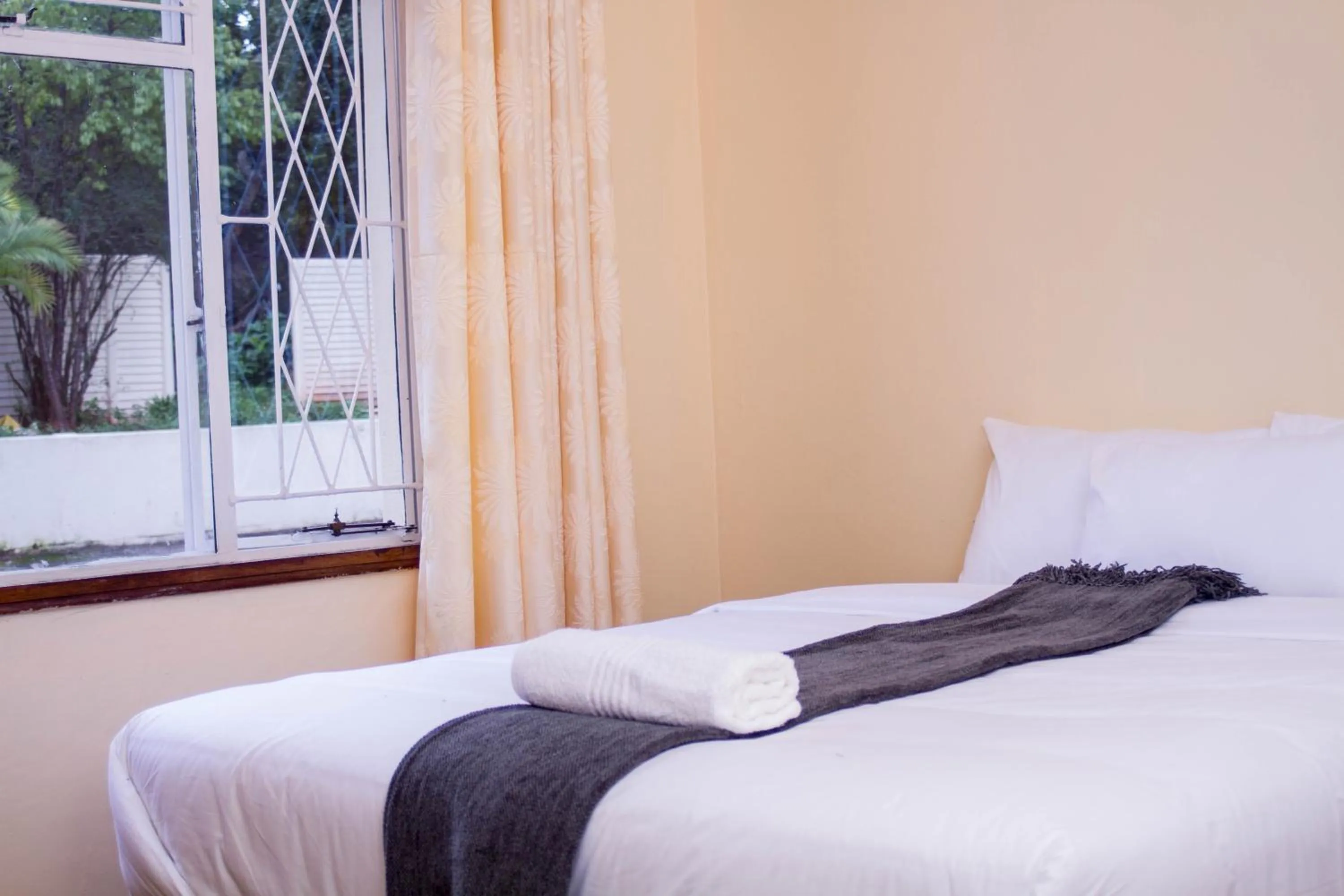 Bed in Royal Guest House