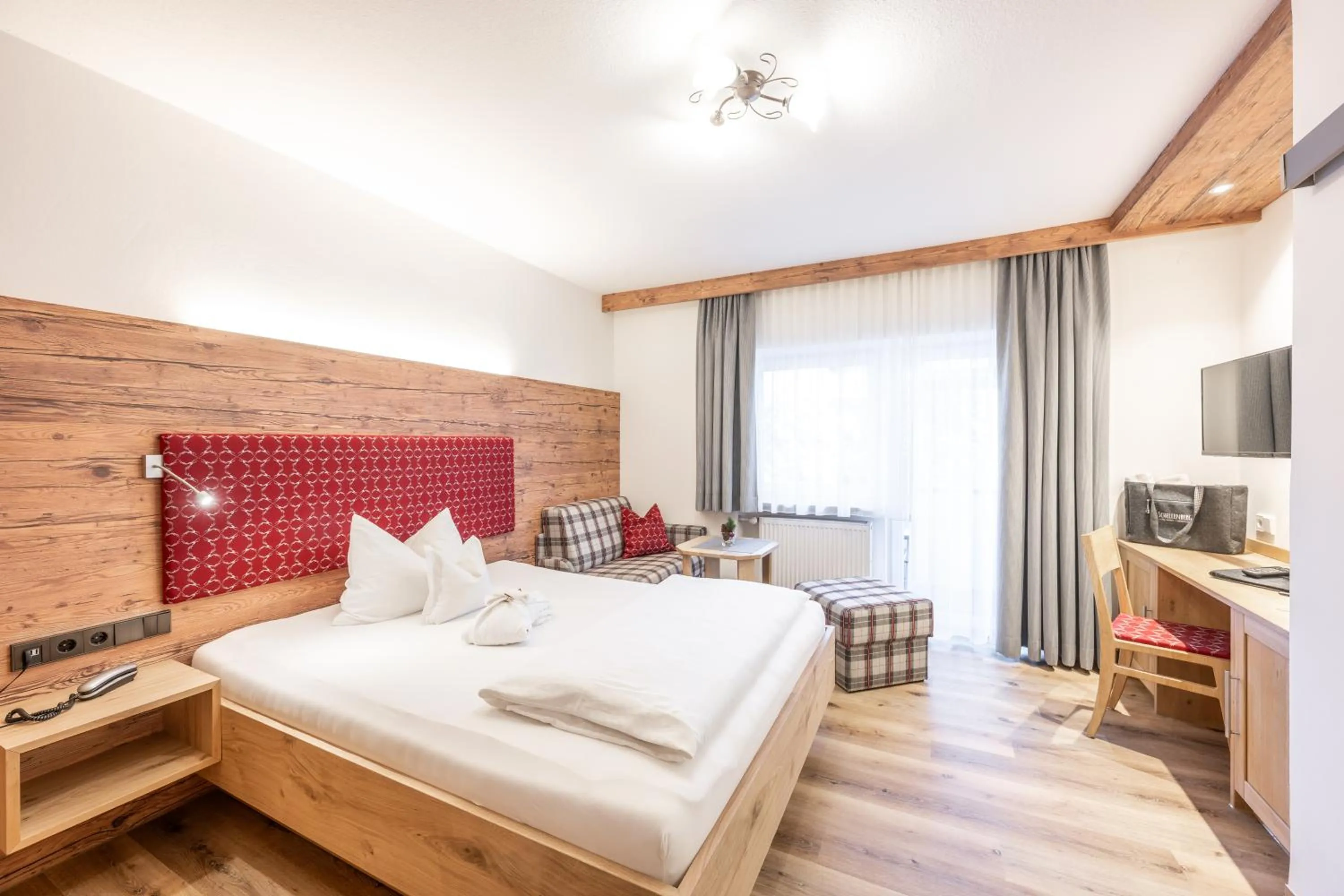 Photo of the whole room, Bed in Hotel Garni Schellenberg