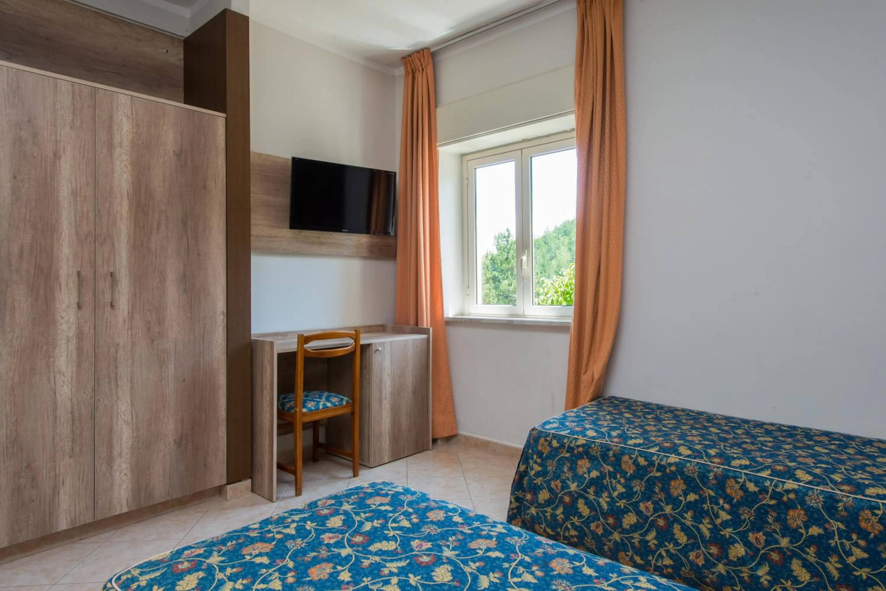 Bedroom, Bed in Hotel Tasso