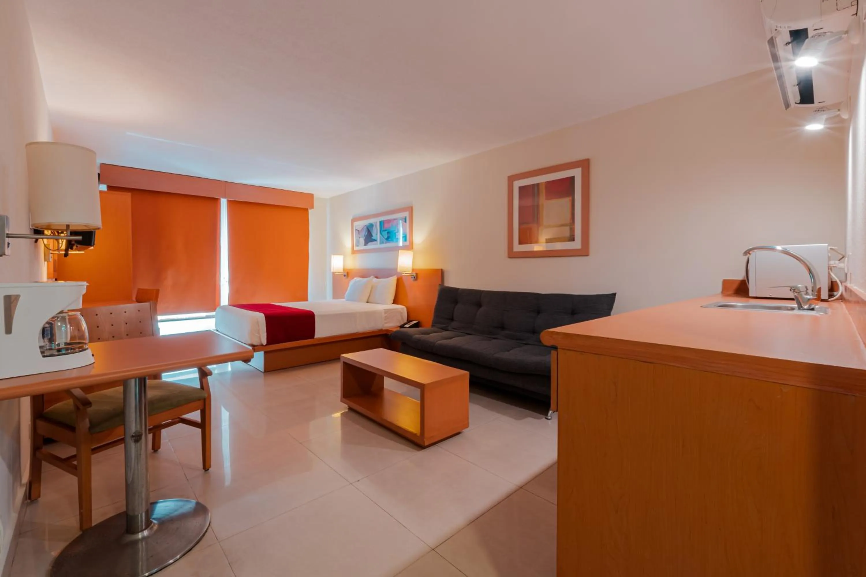 TV and multimedia in City Express by Marriott Mazatlan