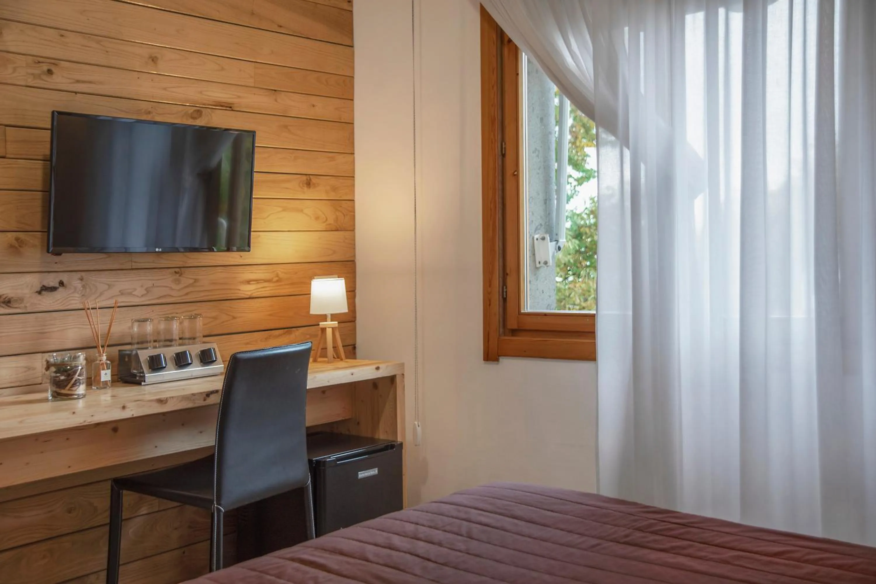 Bed in Piccolo Hotel Aurora