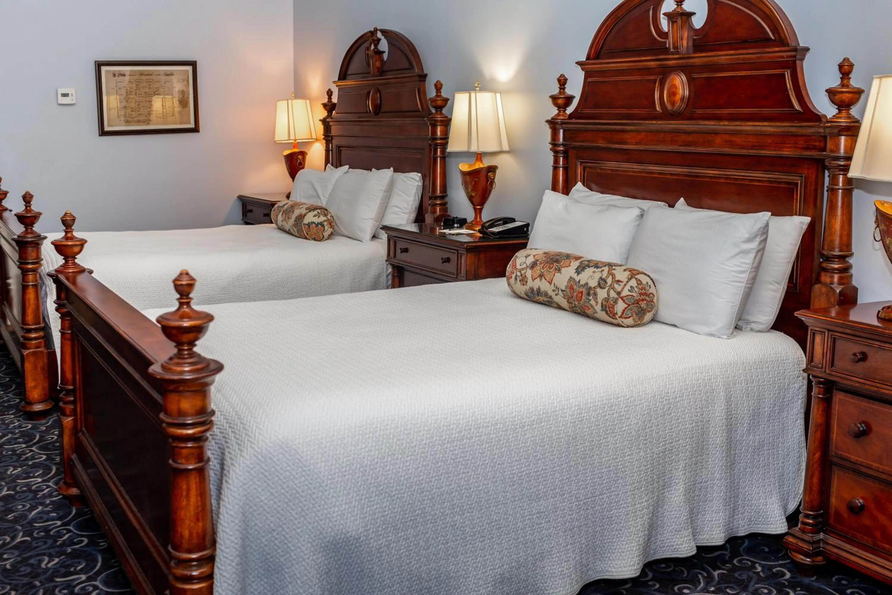Bed in East Bay Inn, Historic Inns of Savannah Collection