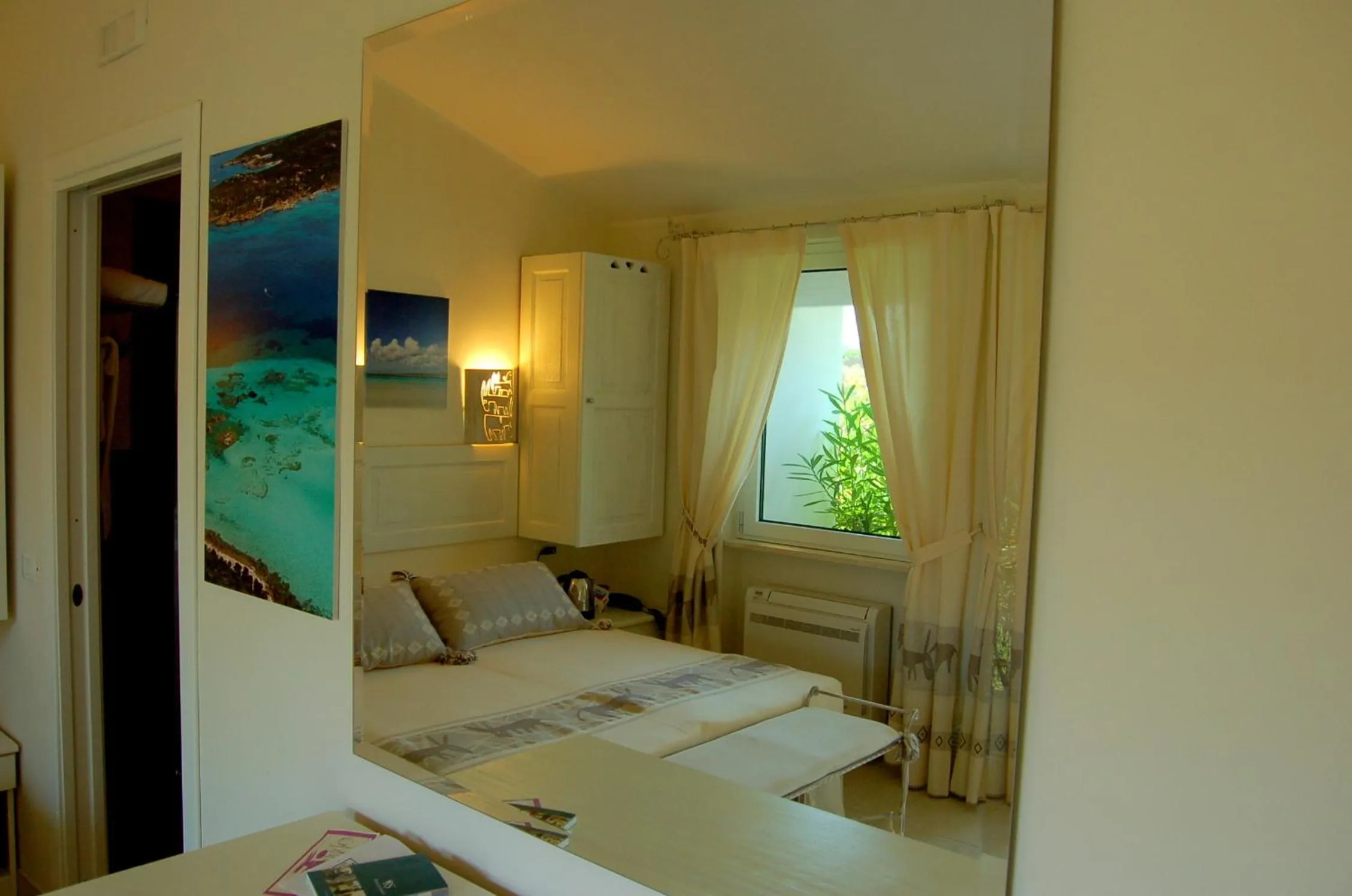 Photo of the whole room, Bed in Hotel Budoni Beach