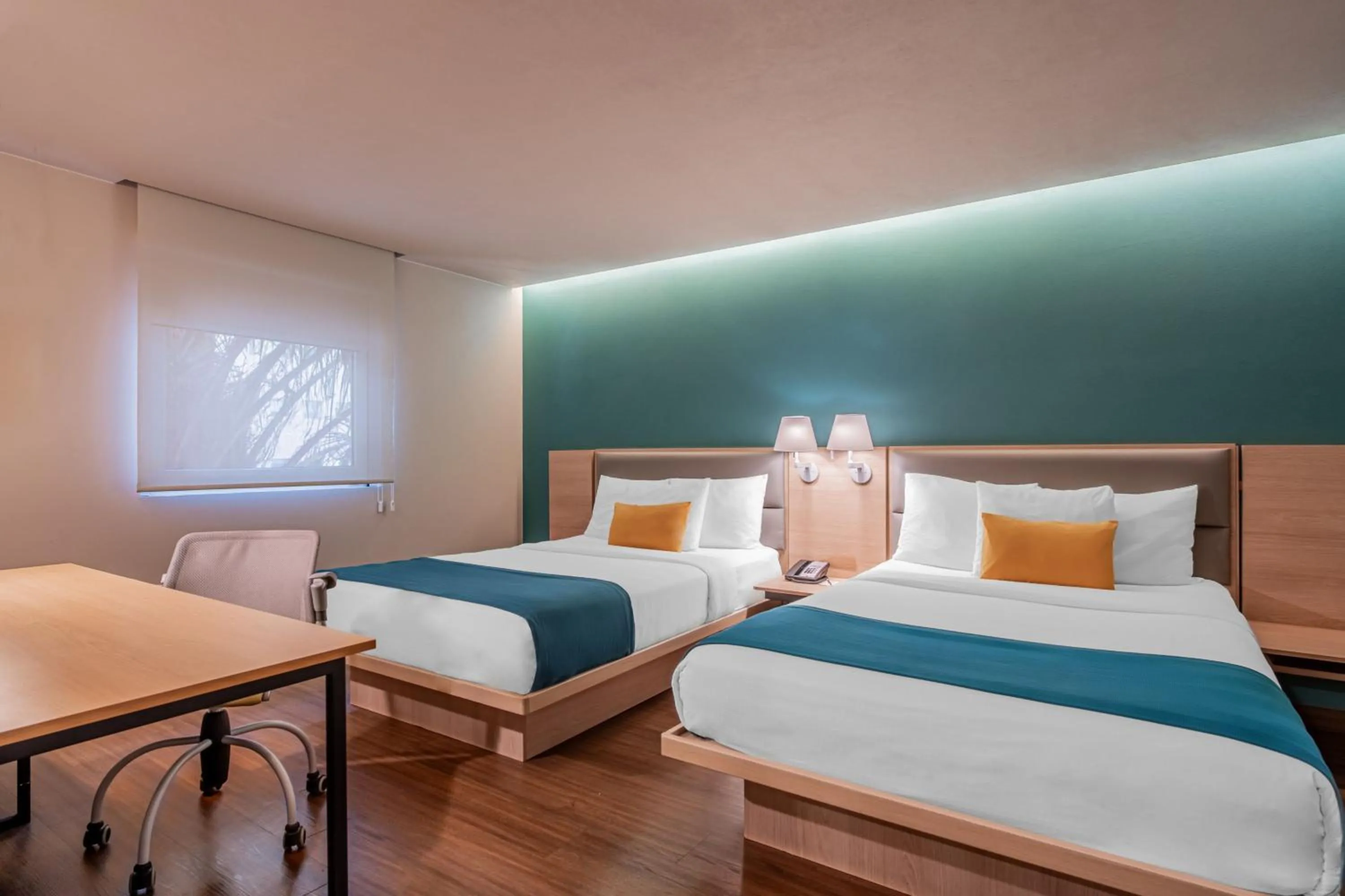 Photo of the whole room, Bed in City Express Suites by Marriott Queretaro