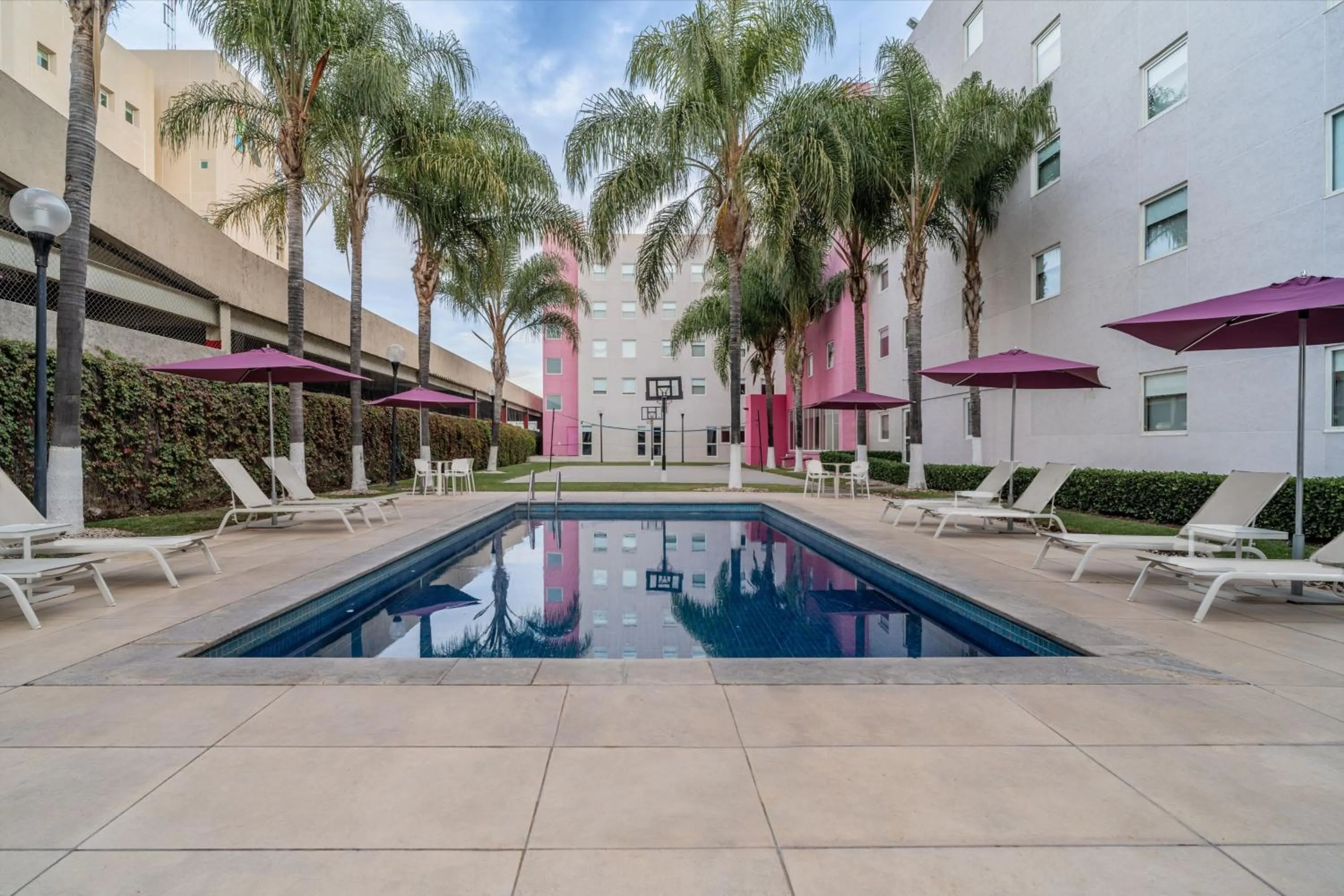 Swimming pool in City Express Suites by Marriott Queretaro