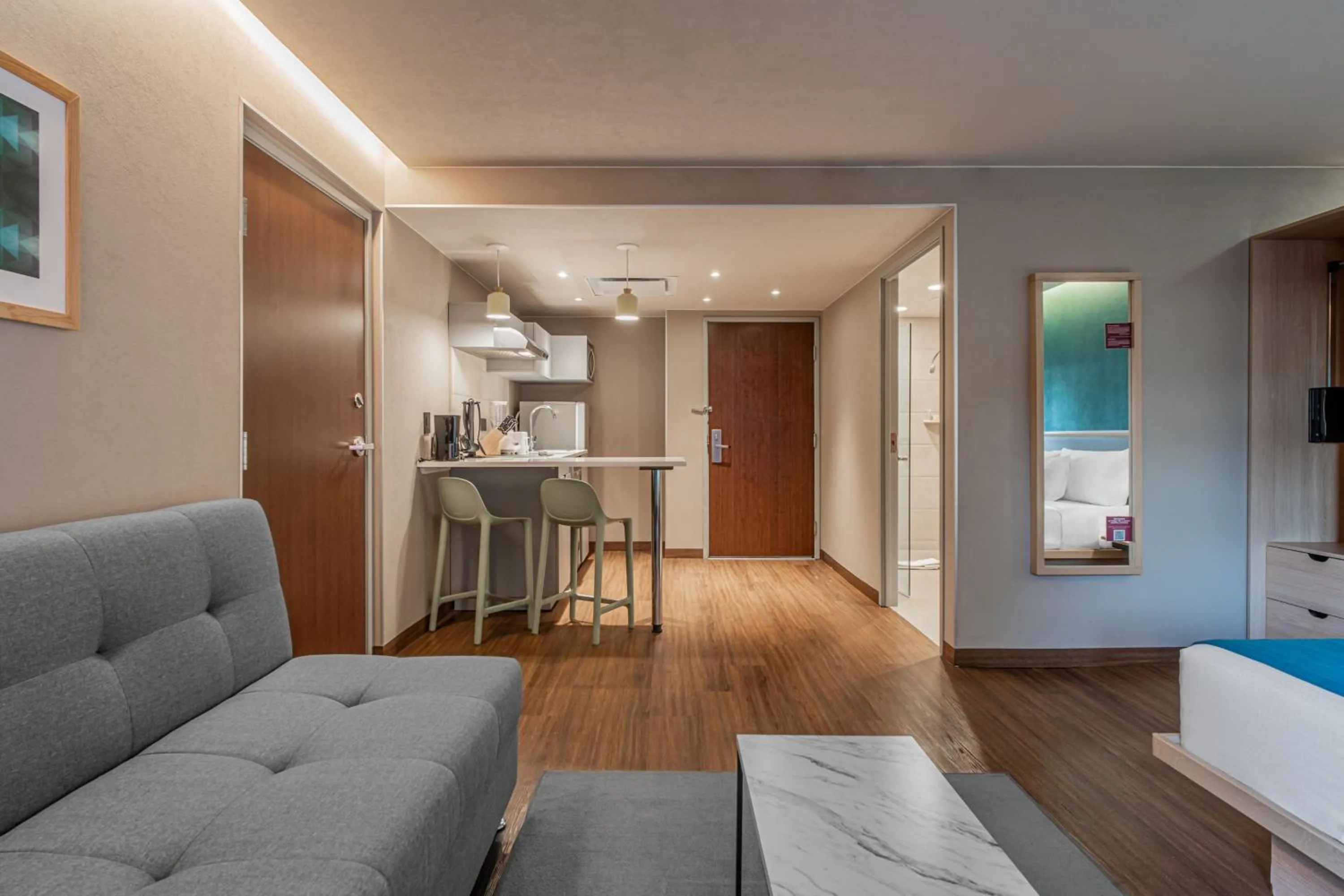 Living room, Bed in City Express Suites by Marriott Queretaro