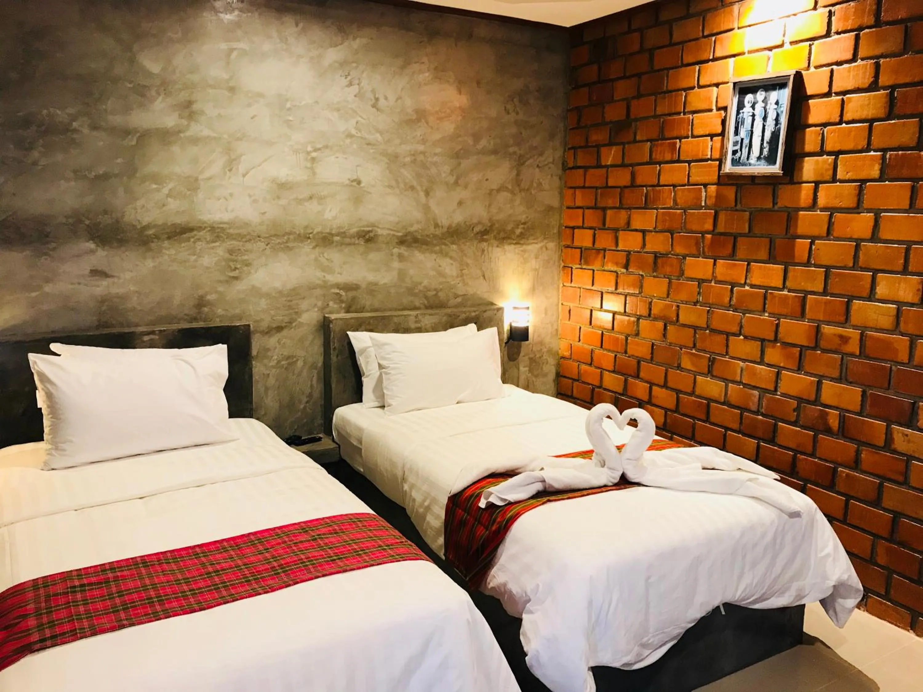 Bed in Khum Lanna Boutique Hotel