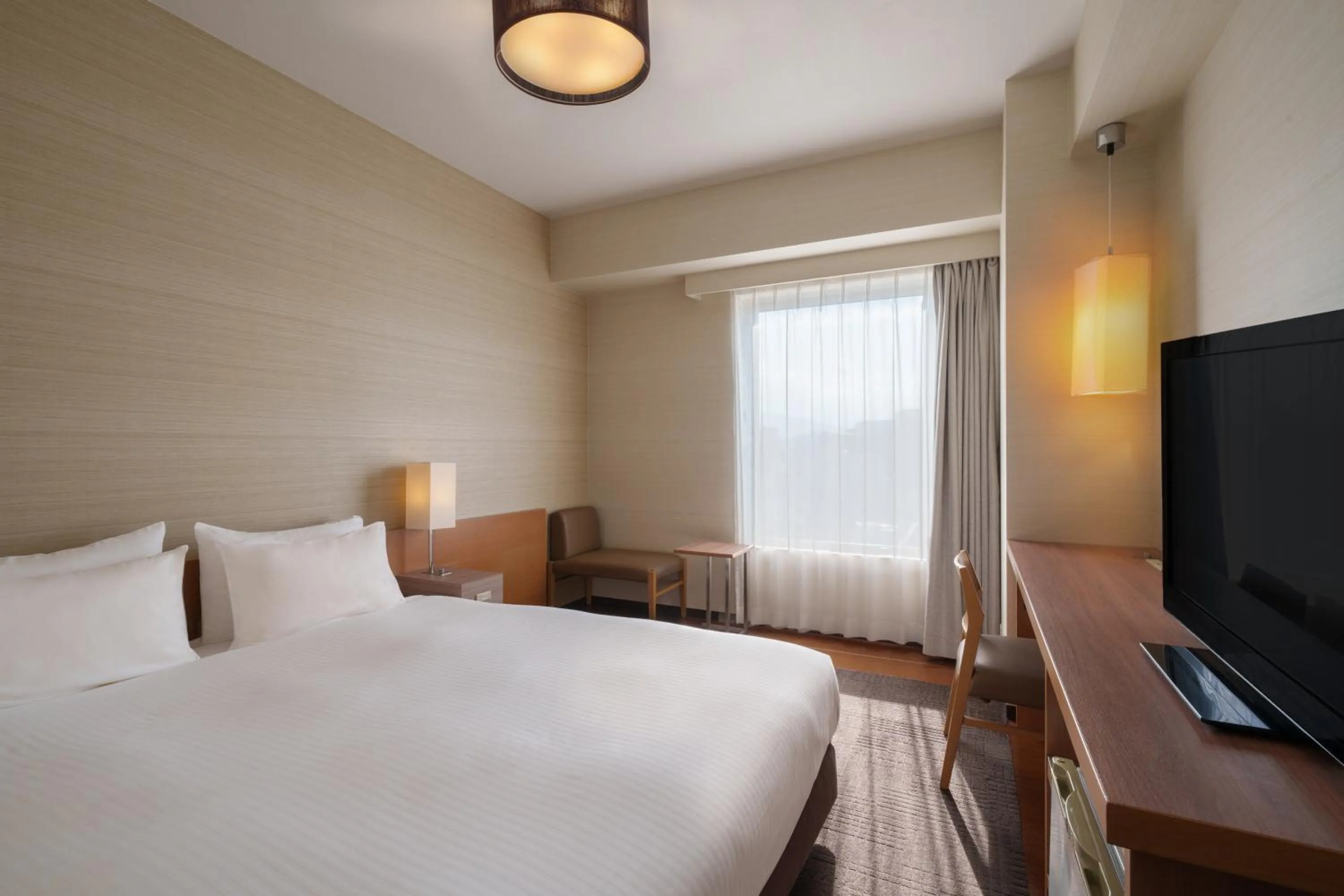 Photo of the whole room, Bed in Hotel Resol Trinity Hakata
