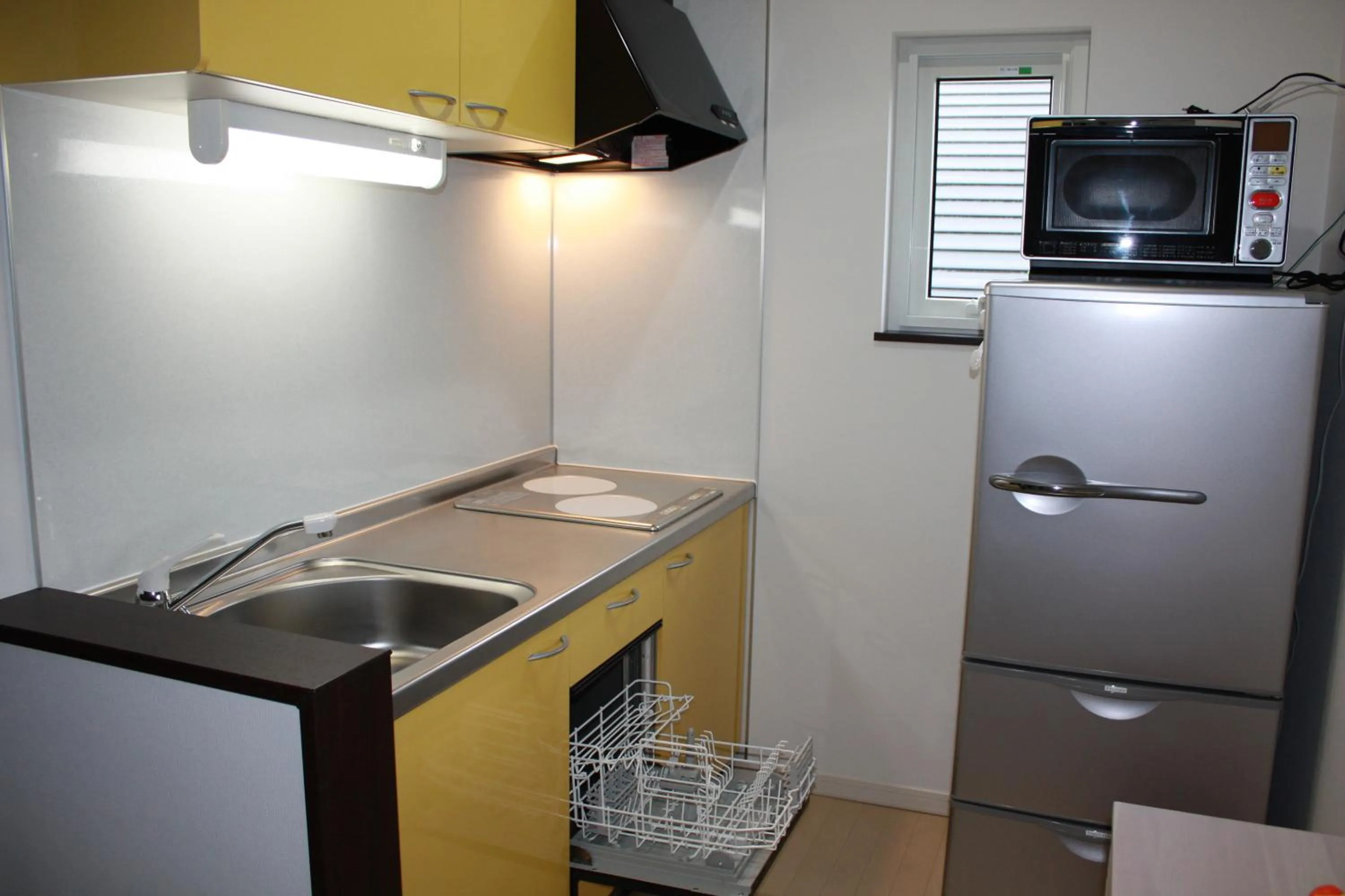 Kitchen or kitchenette in Tsuru Apartments