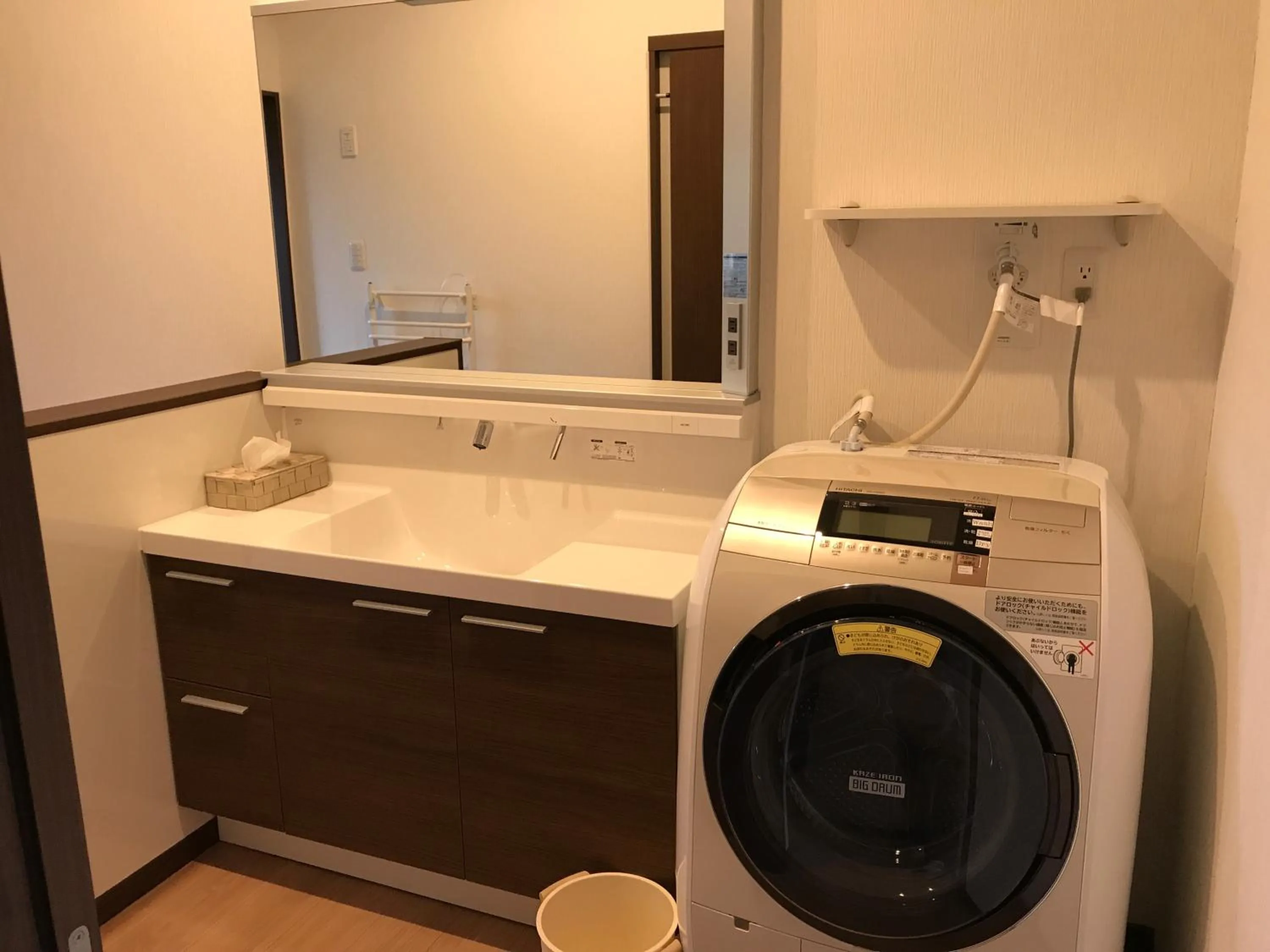 washing machine in Tsuru Apartments
