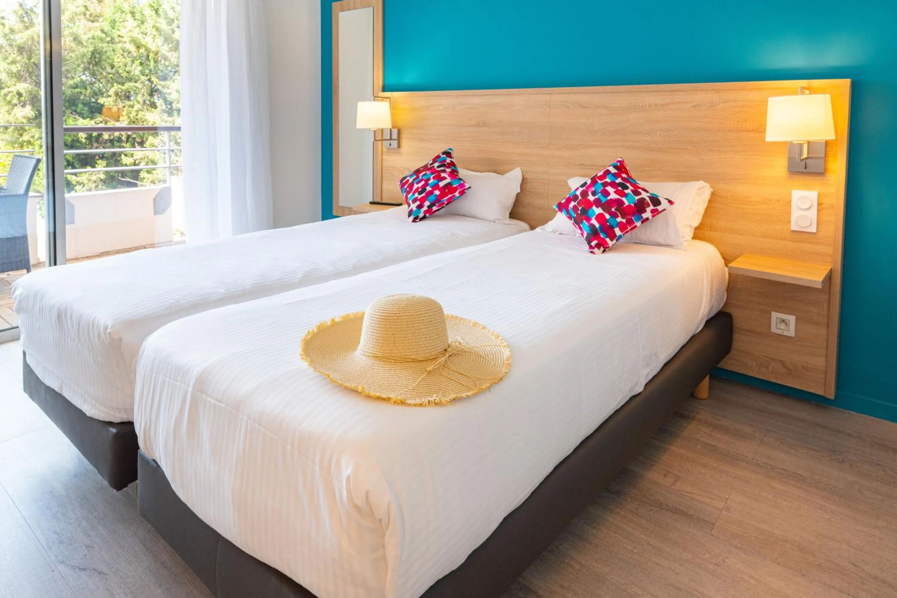 Bed in Zenitude Hôtel-Résidences Le Cannet