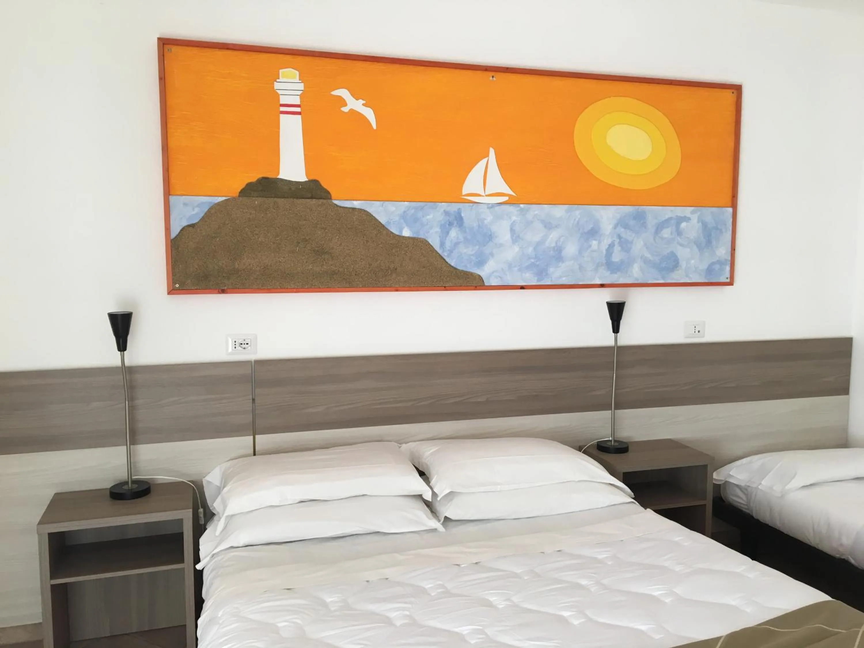 Bed in Hotel Corallo