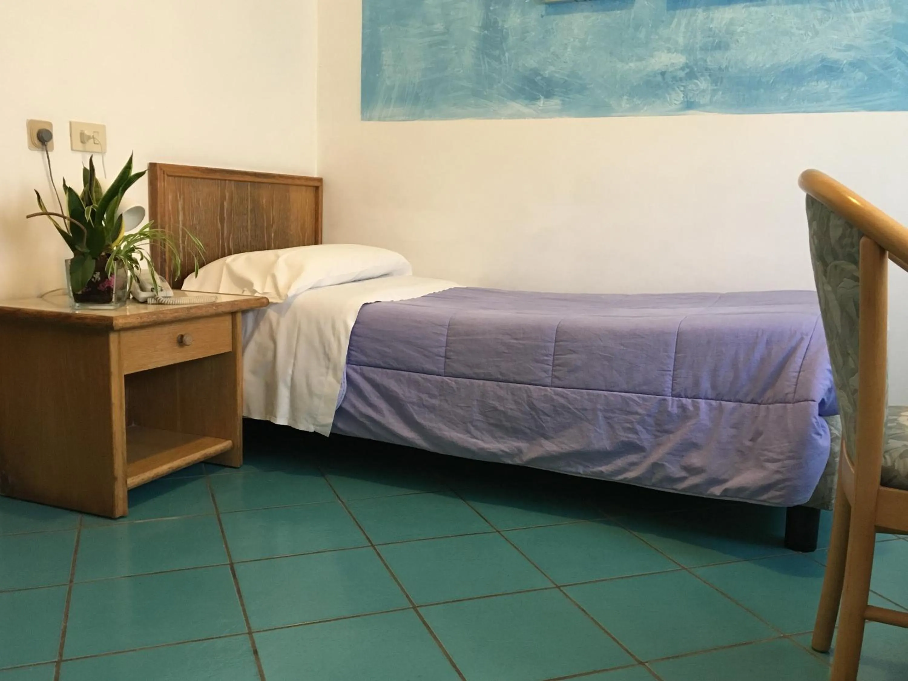 Bed in Hotel Corallo