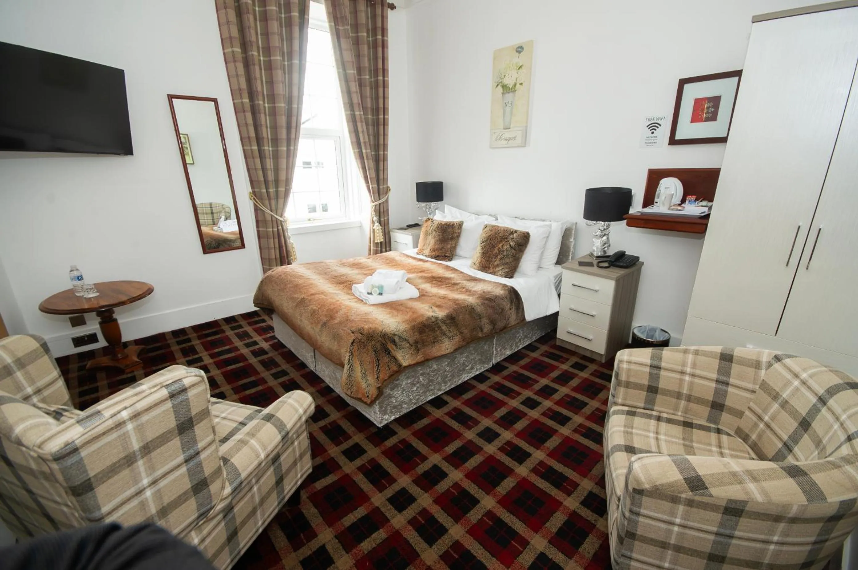 Photo of the whole room, Bed in Haughton Arms Hotel
