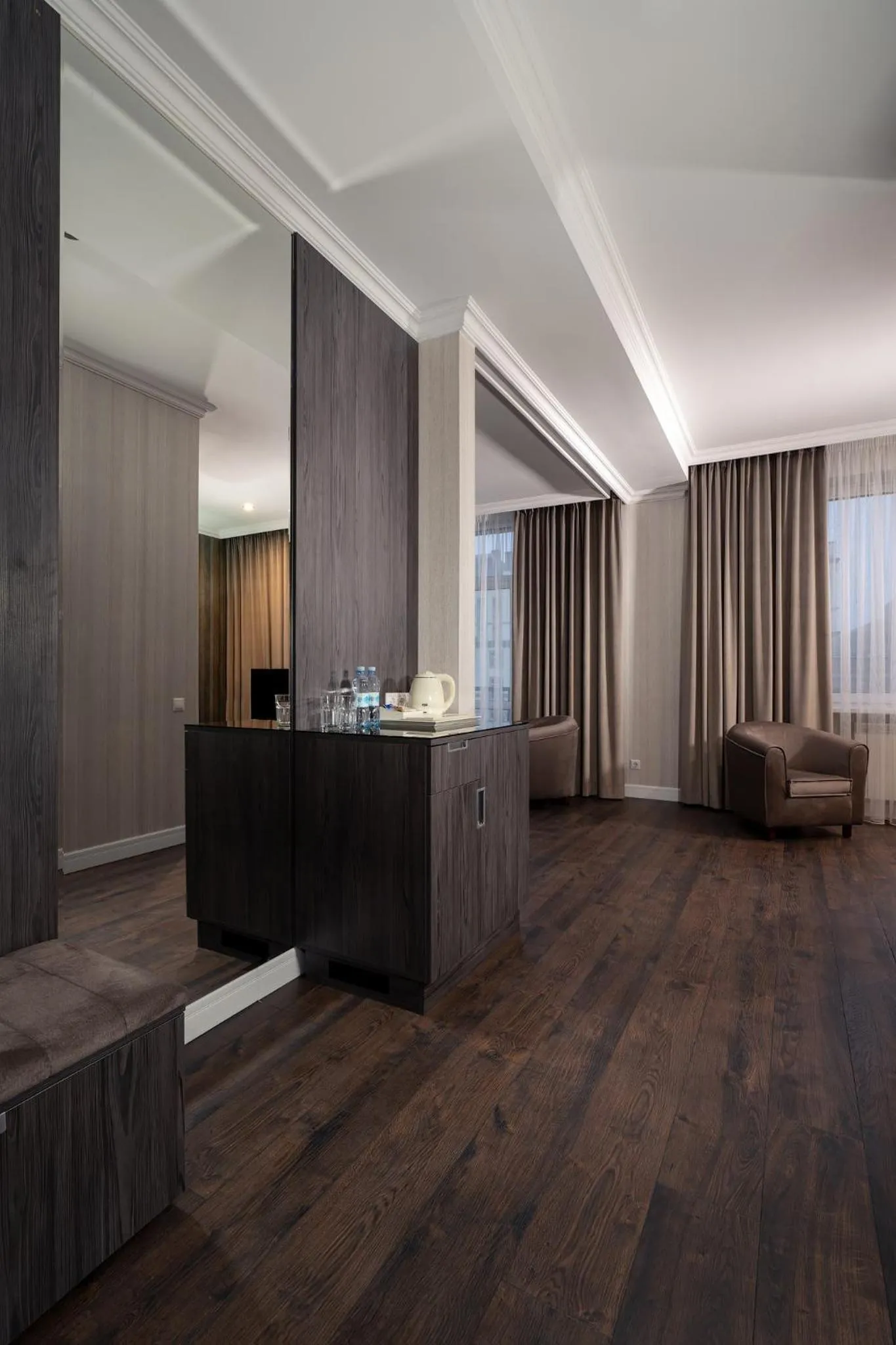 Seating area in Greguar Hotel by UHM