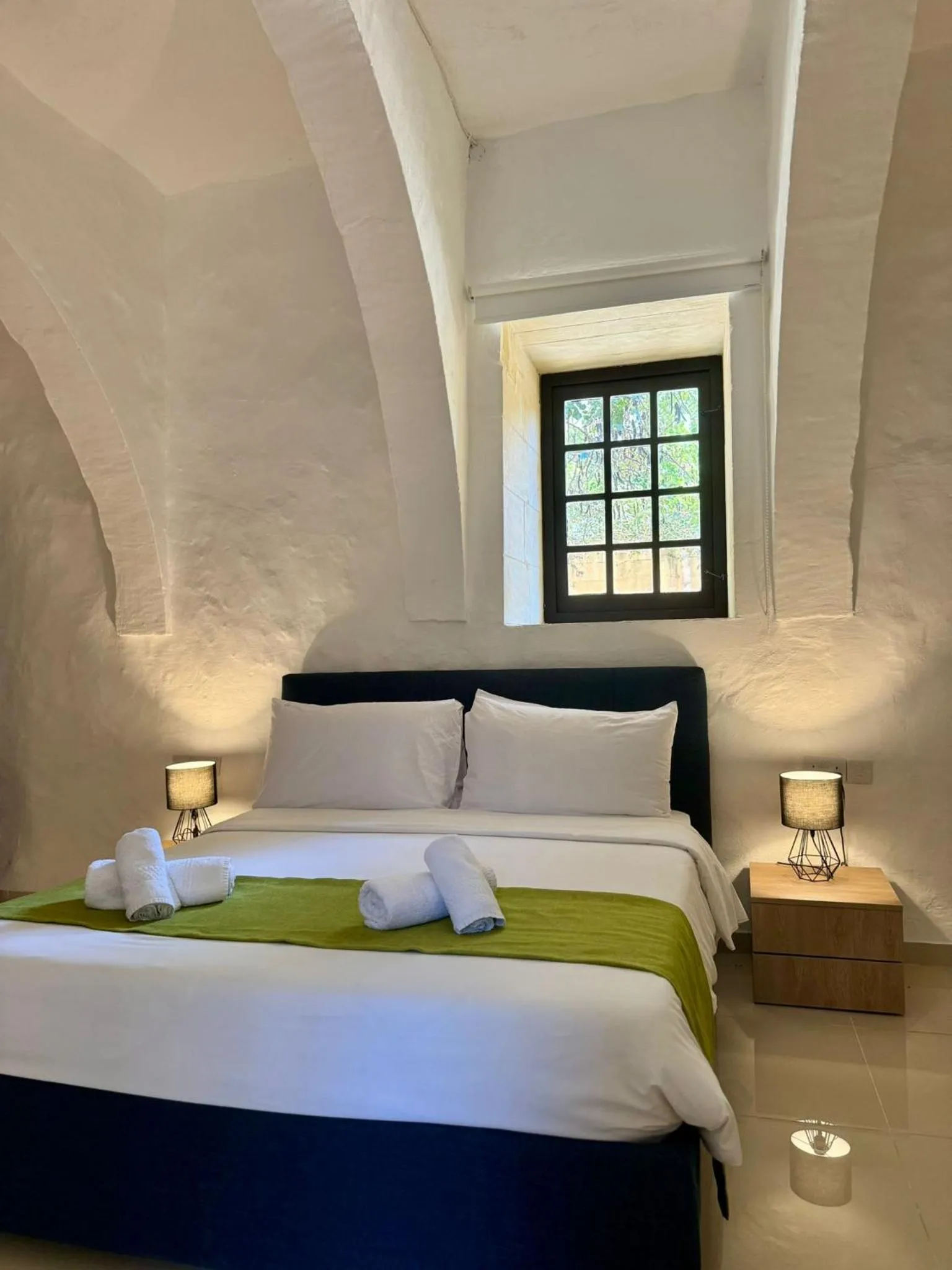 Bed in Cornucopia Hotel