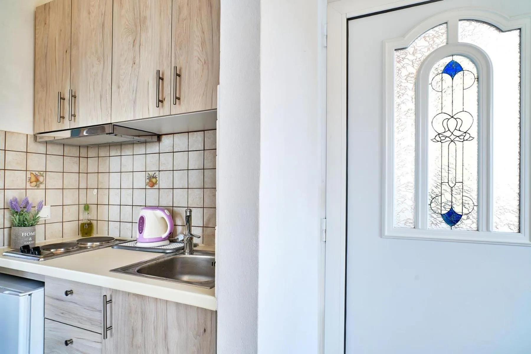 Kitchen or kitchenette in Solon Apartments