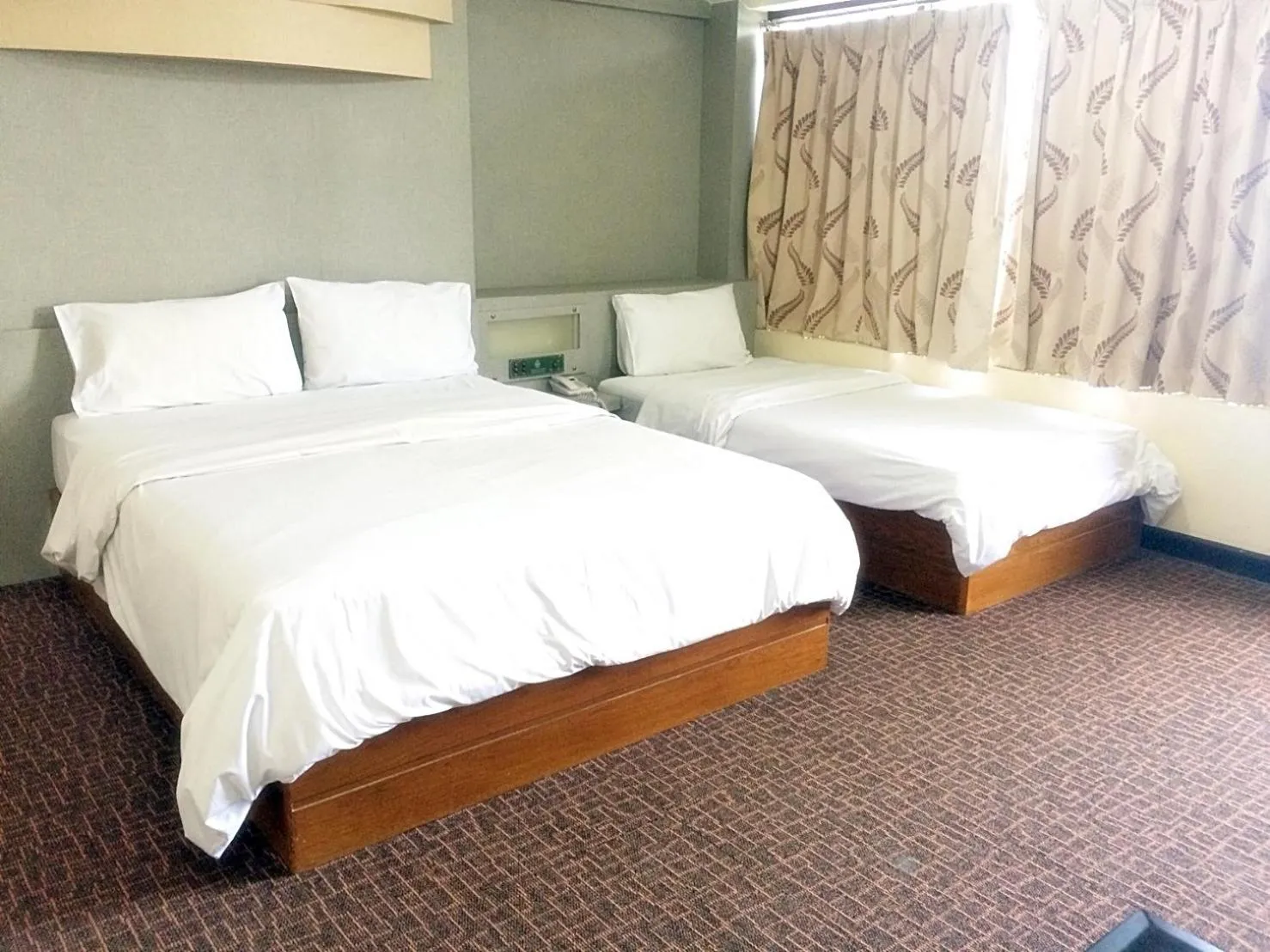 Bed in K.S.Pavilion Hotel
