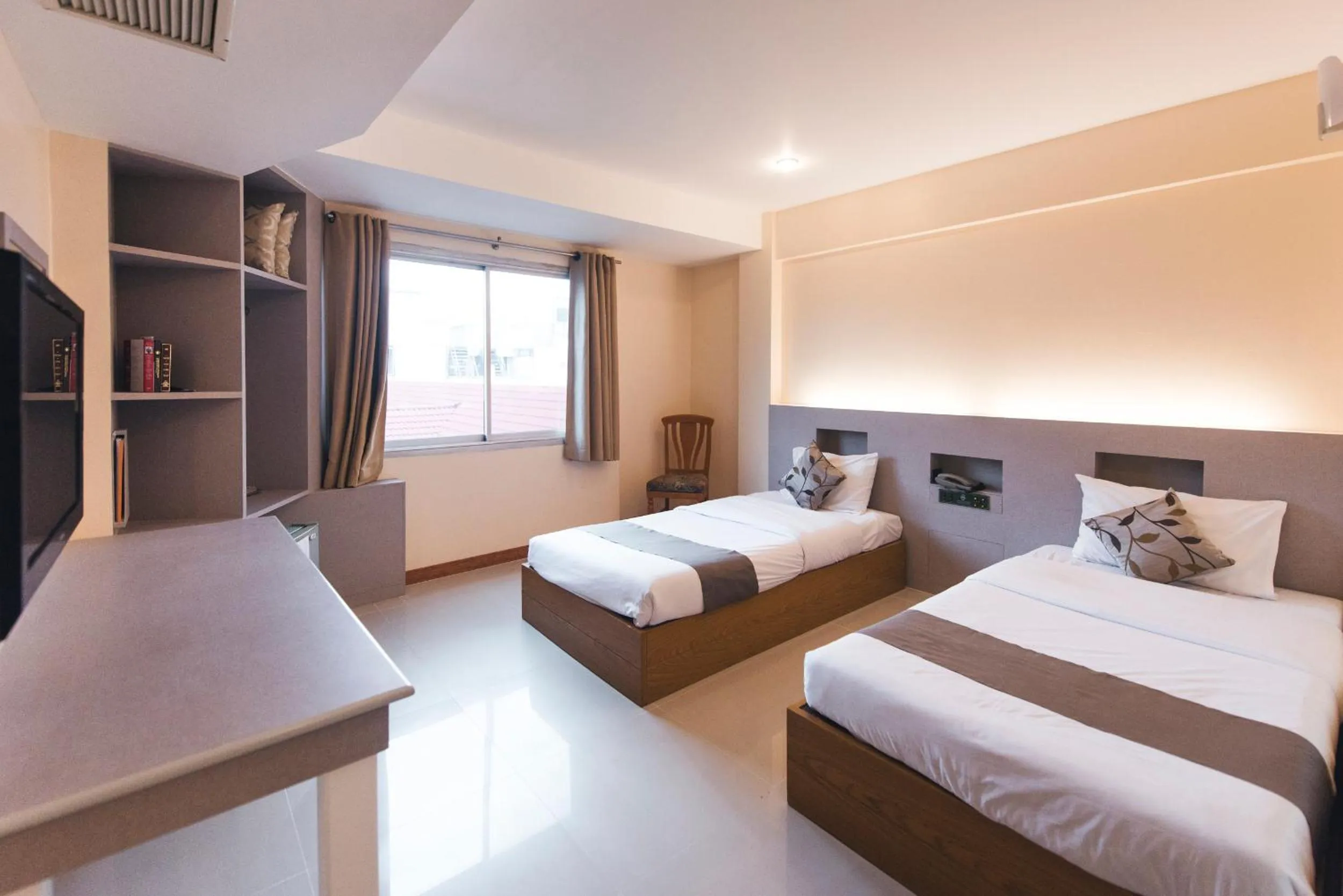 Bed in K.S.Pavilion Hotel