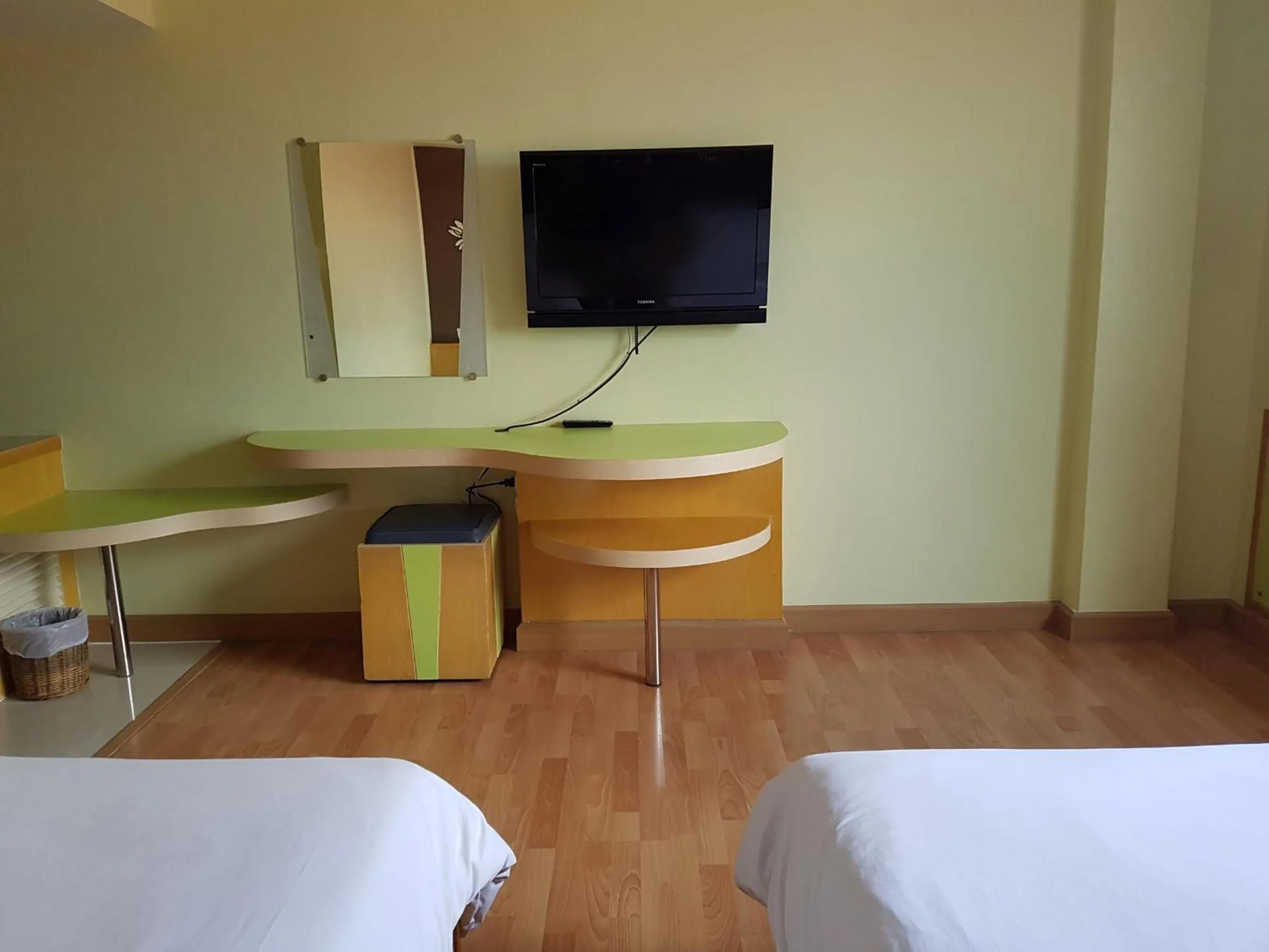 Bed in K.S.Pavilion Hotel