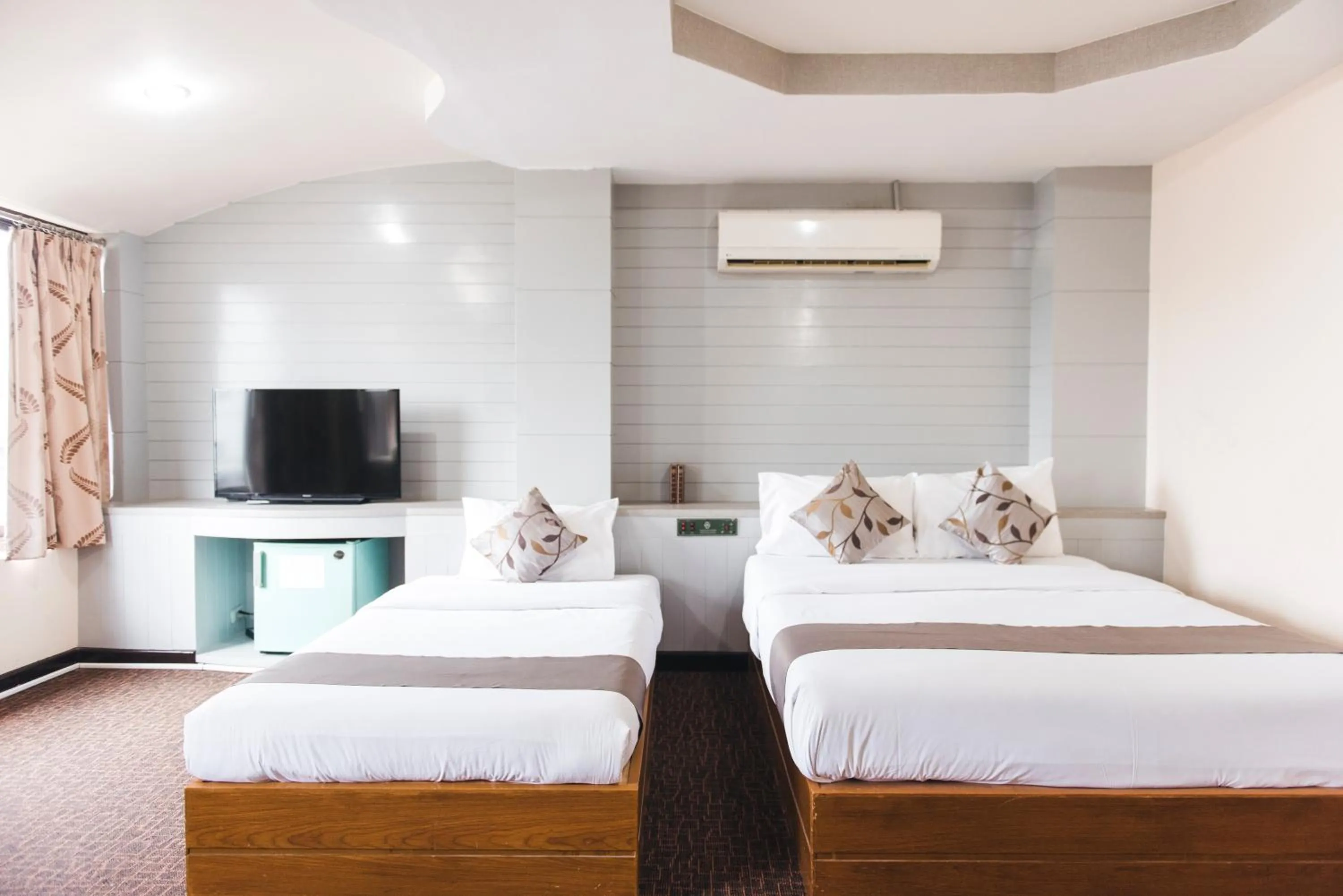 Bed in K.S.Pavilion Hotel