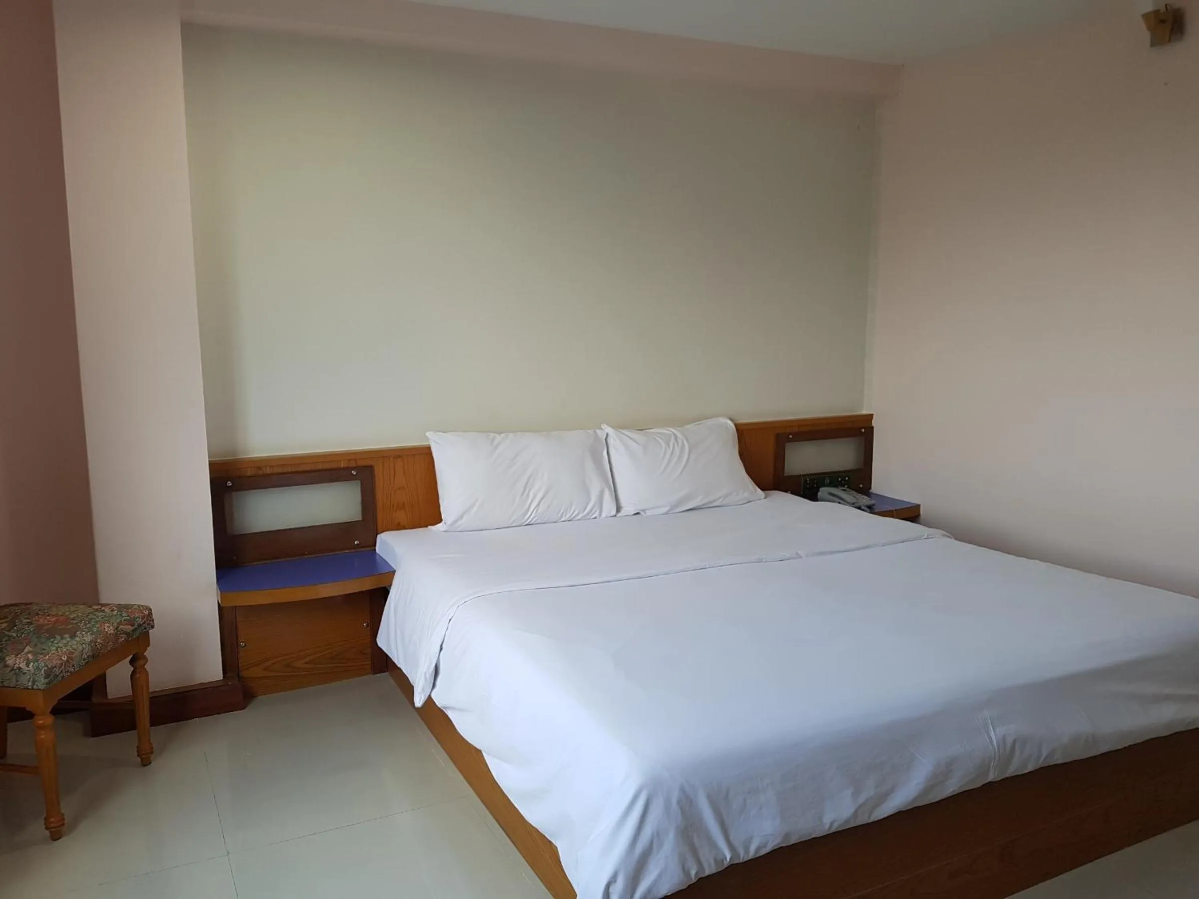 Bed in K.S.Pavilion Hotel