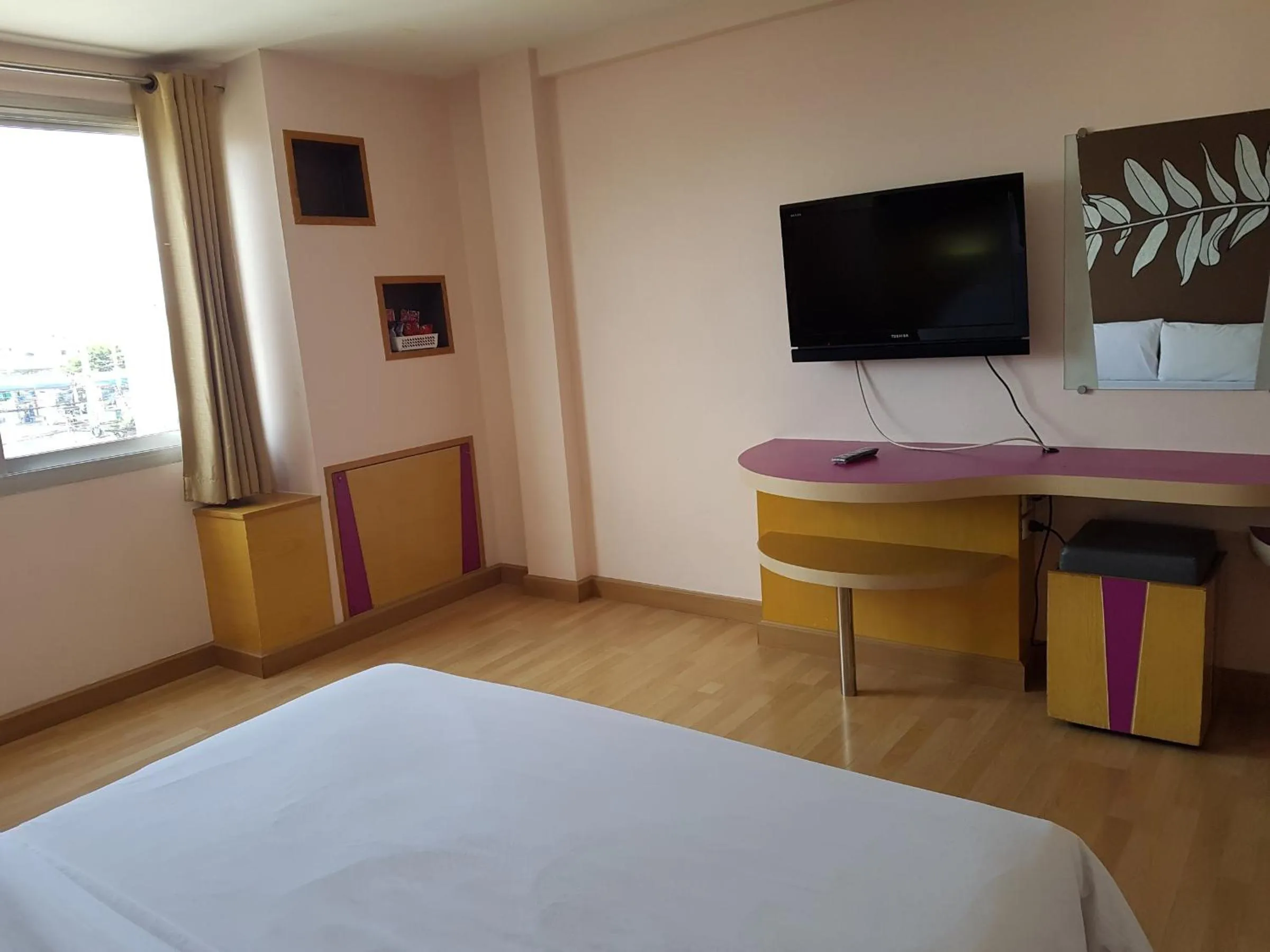 Bed in K.S.Pavilion Hotel