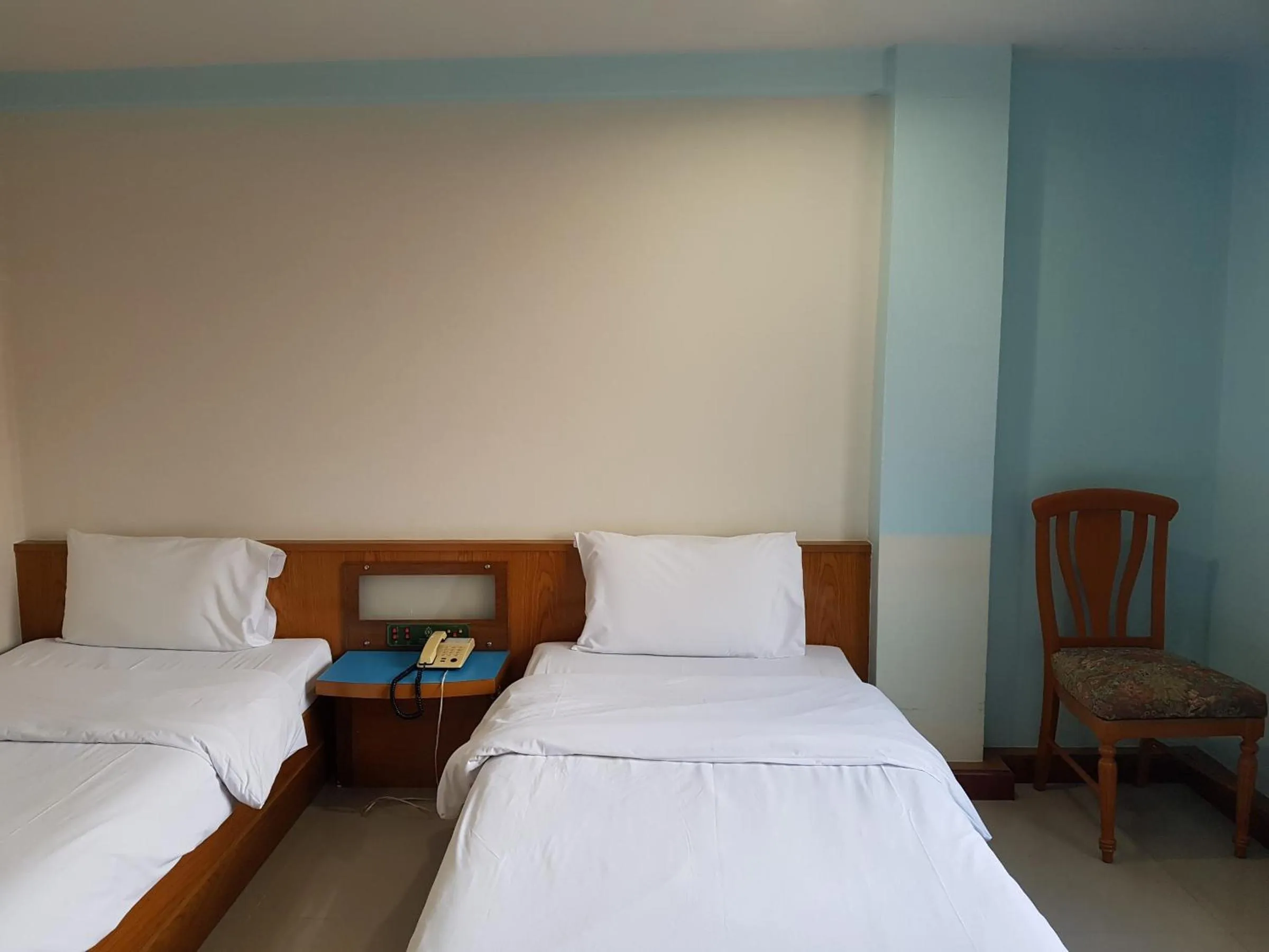 Bed in K.S.Pavilion Hotel