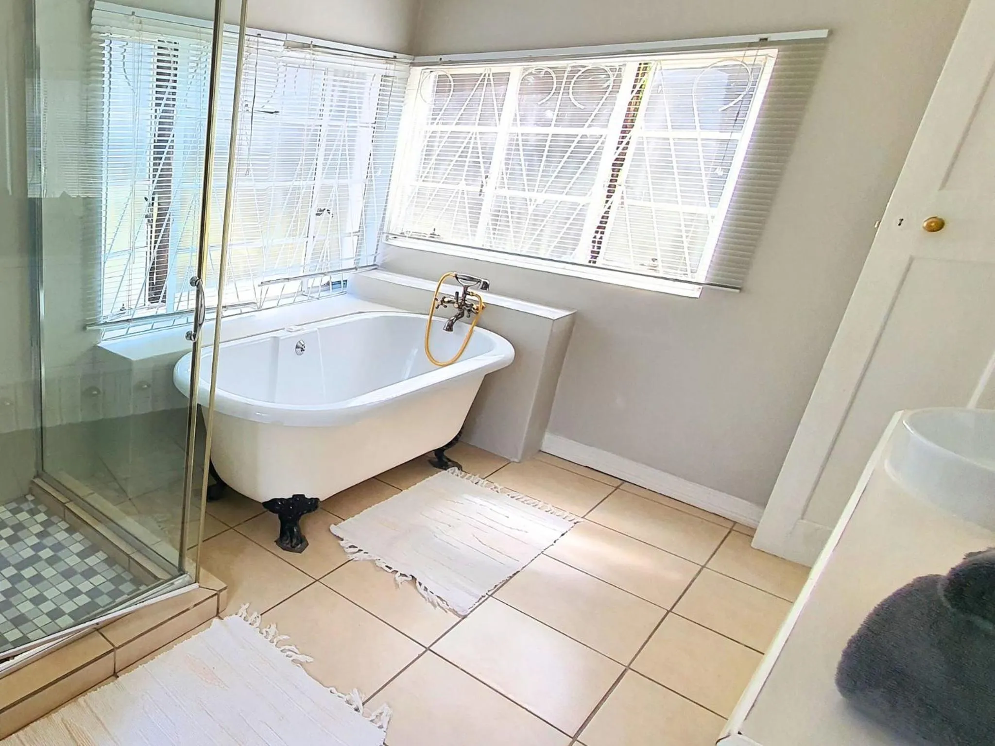 Shower in The Browns' Luxury Suites & Cottage