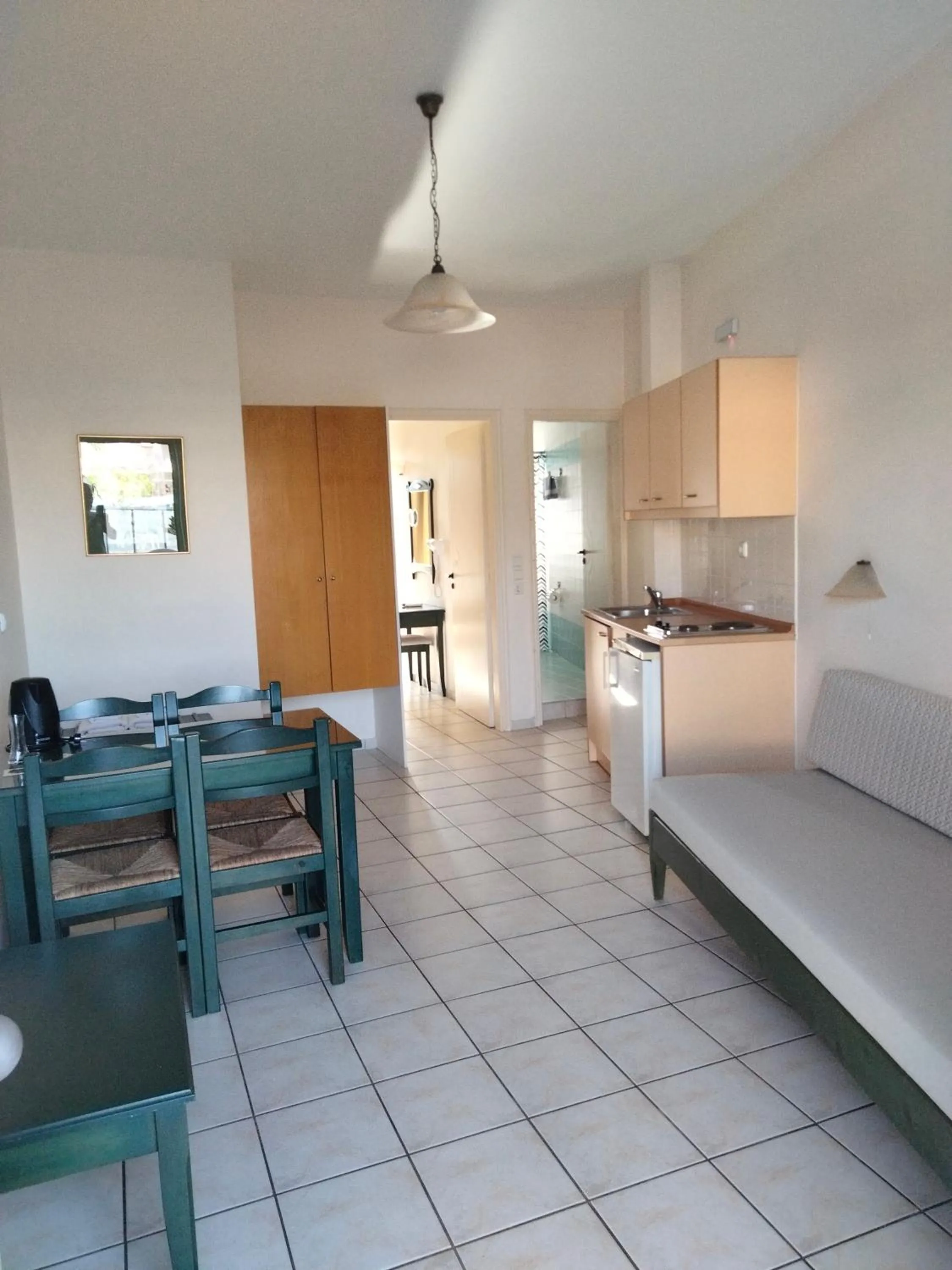 Living room, Bed in Zannis Hotel